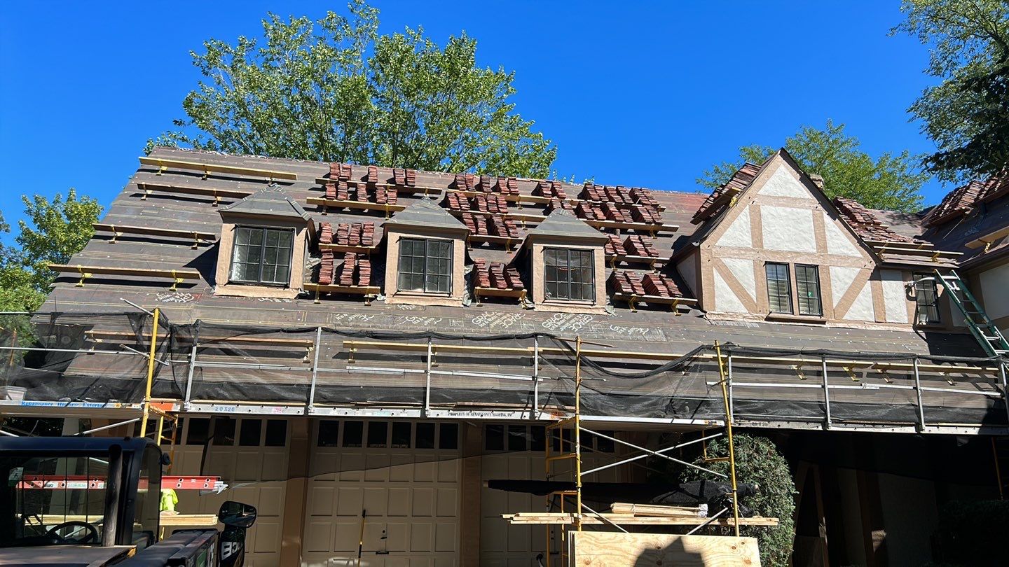 Ludowici Roof Installment and Half Round Copper Gutter Replacement  by Custom Installations