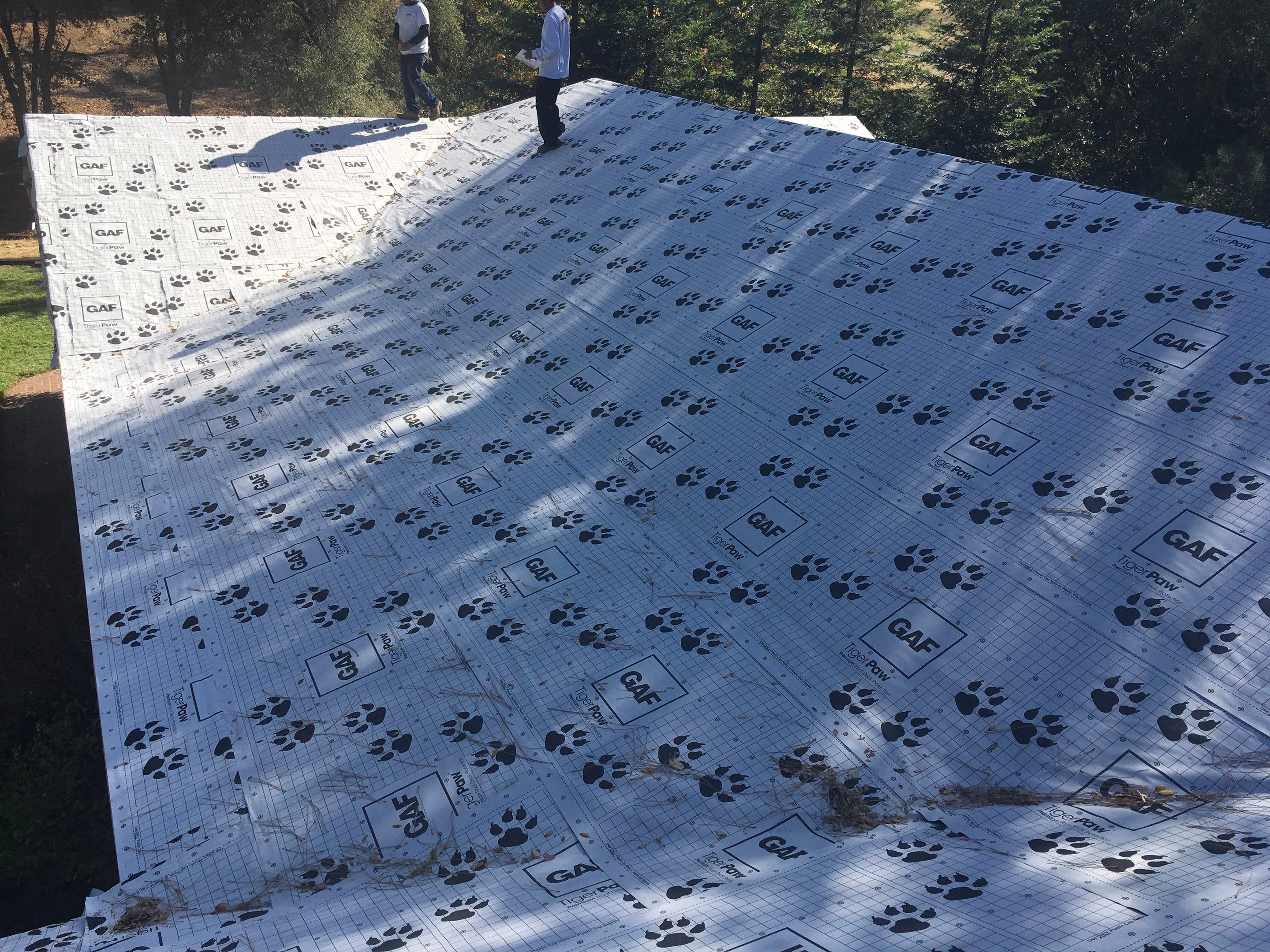 Metal roofing installation using Standing seam metal roofing system by Straight Edge Roofing Inc