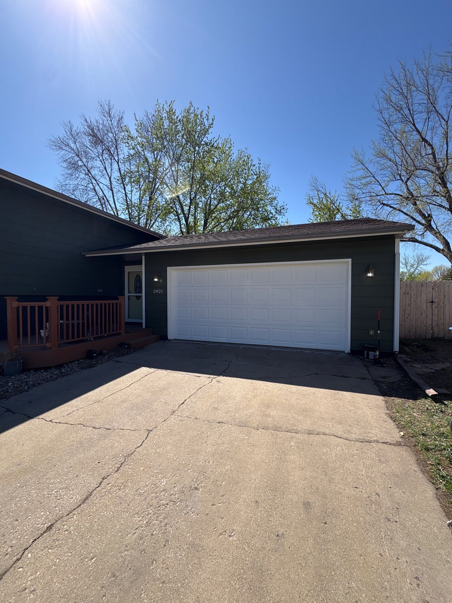 Full Exterior House Painting and Foundation Refinishing in Sioux Falls by Select Painting, Coatings & Garage Cabinets