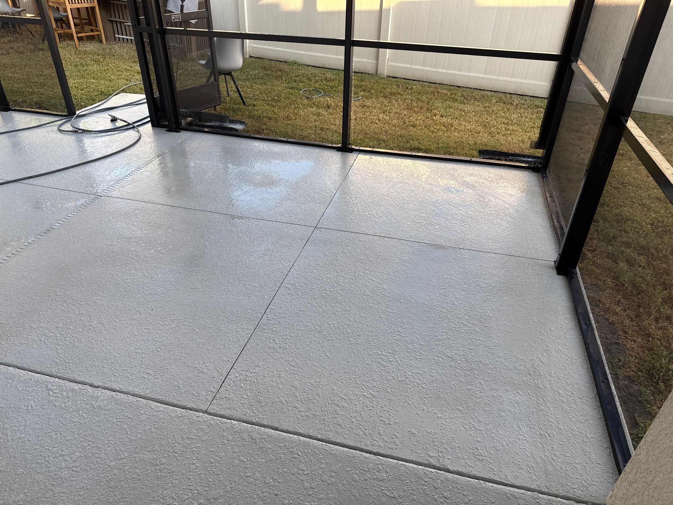 Painted Pool Deck & Screen Enclosure Cleaning | Heron Creek, Palmetto FL by Sunshine AquaWash