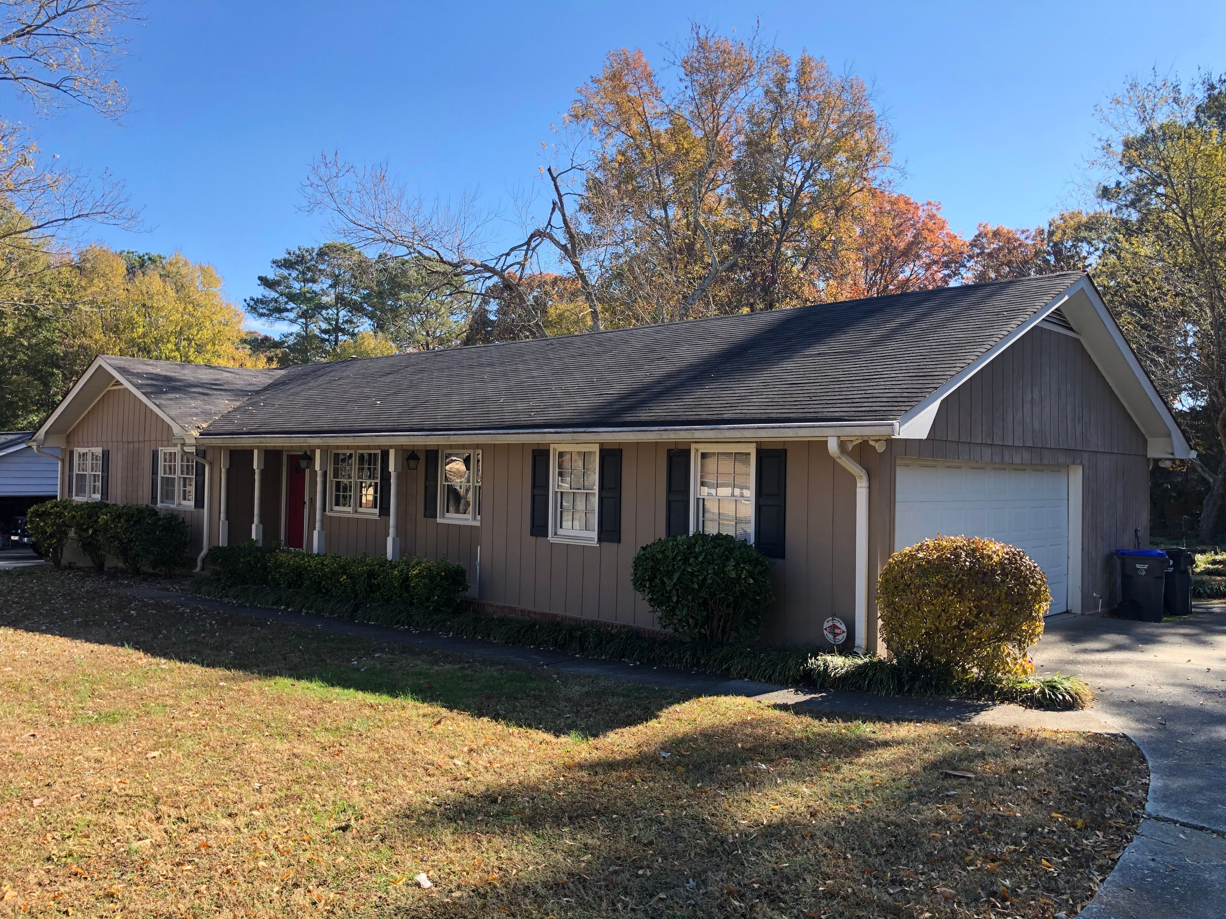 Full Exterior House Painting Transformation in Snellville Georgia by Swift Home Renovations 