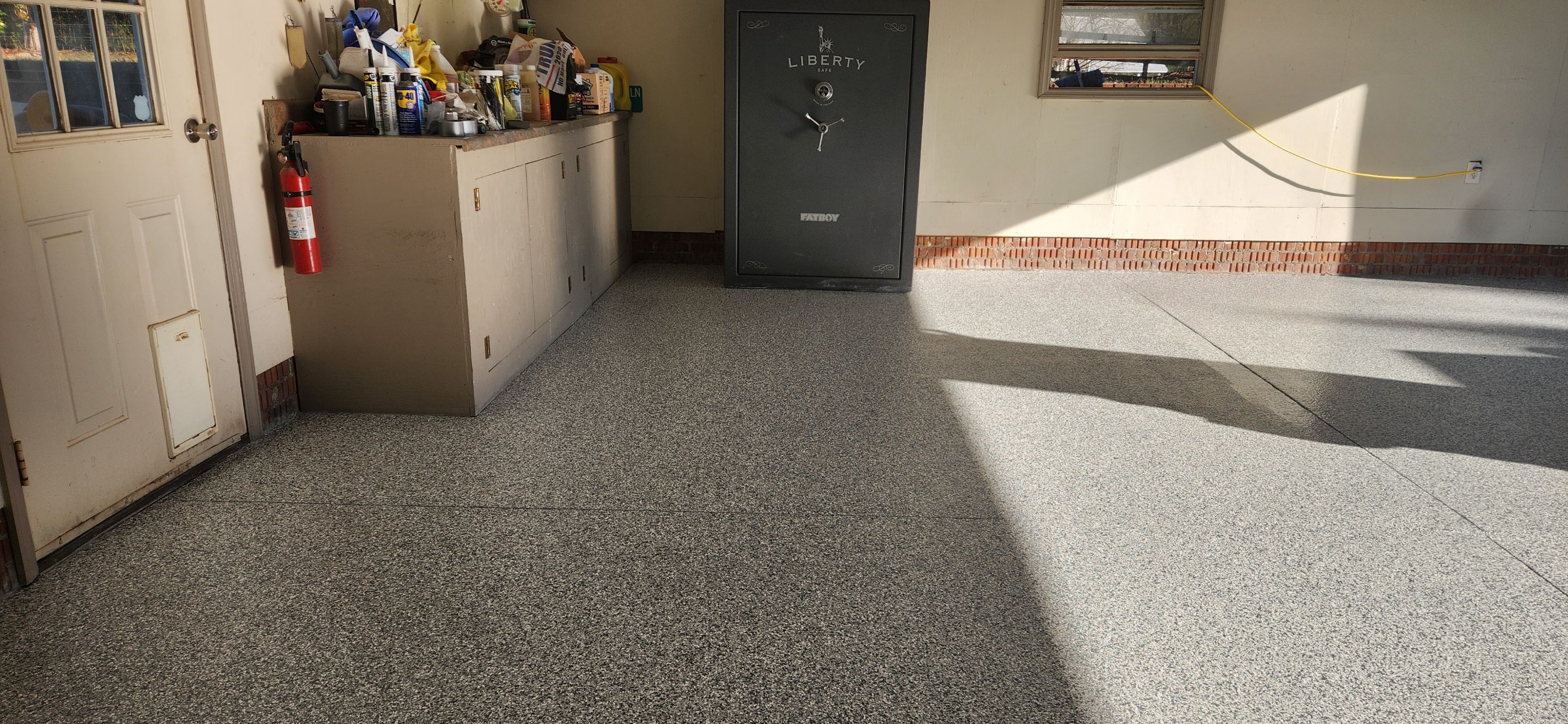 Garage using Gravel by Elite Floor Solutions