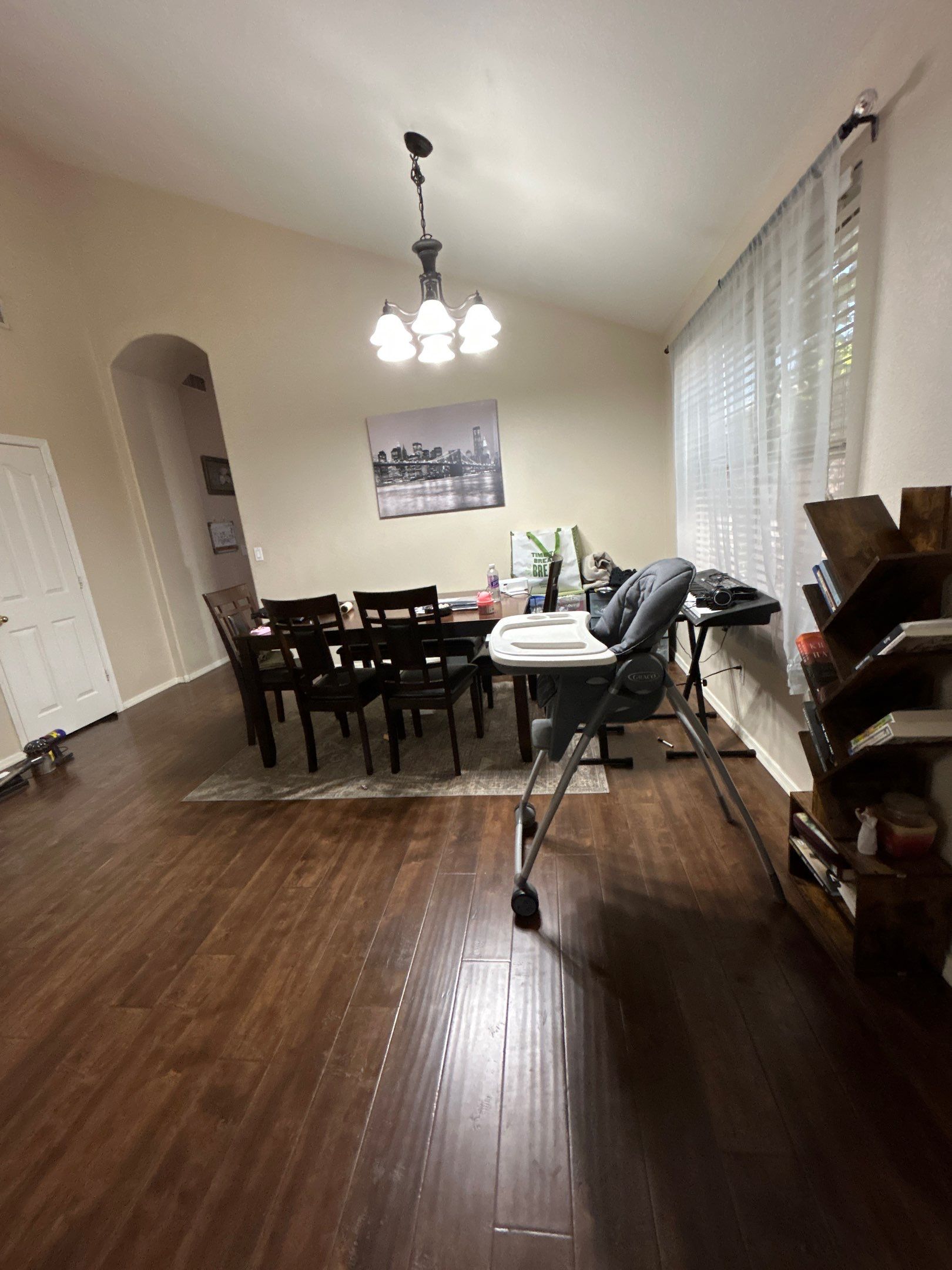 Dark Wood Laminate Flooring Installation for Chandler Dining Room by CompanyCam Sales Demo
