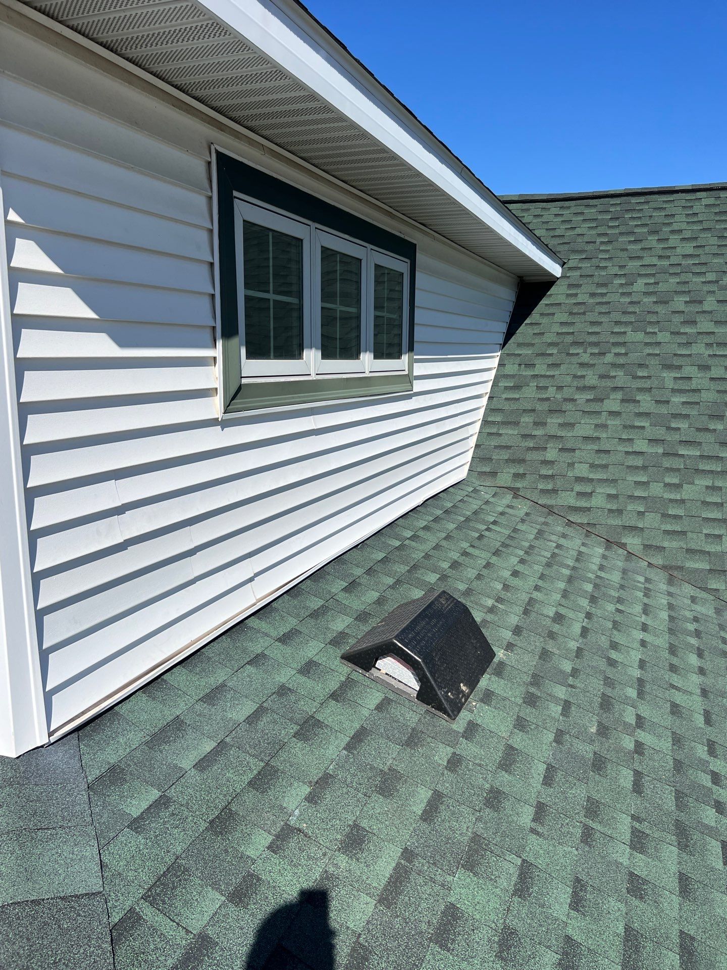 Residential Roofing Replacement with Multiple Skylights in Mason, Michigan by Acme Exteriors