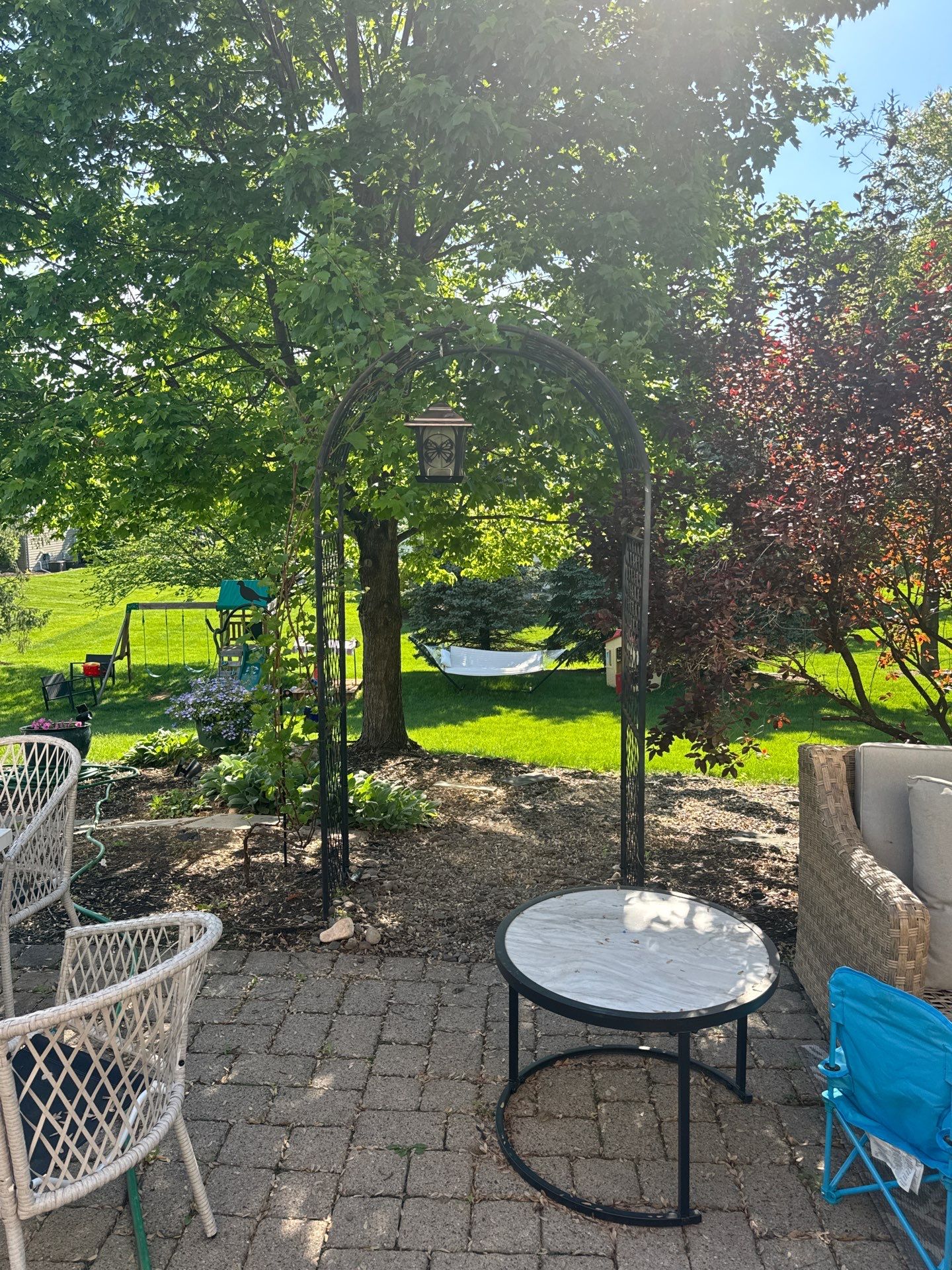 Backyard Retreat: Techo-Bloc Patio + Firepit Lounge by Saylor’s Lawn & Landscape