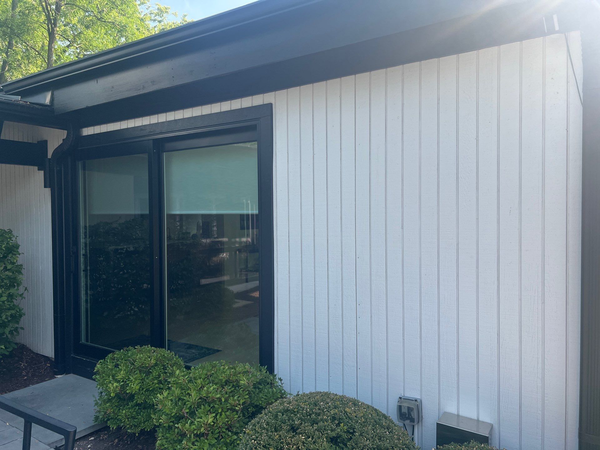 Complete Exterior House, Bluestone & Garage Floor Cleaning by Northern Power Washing LLC.