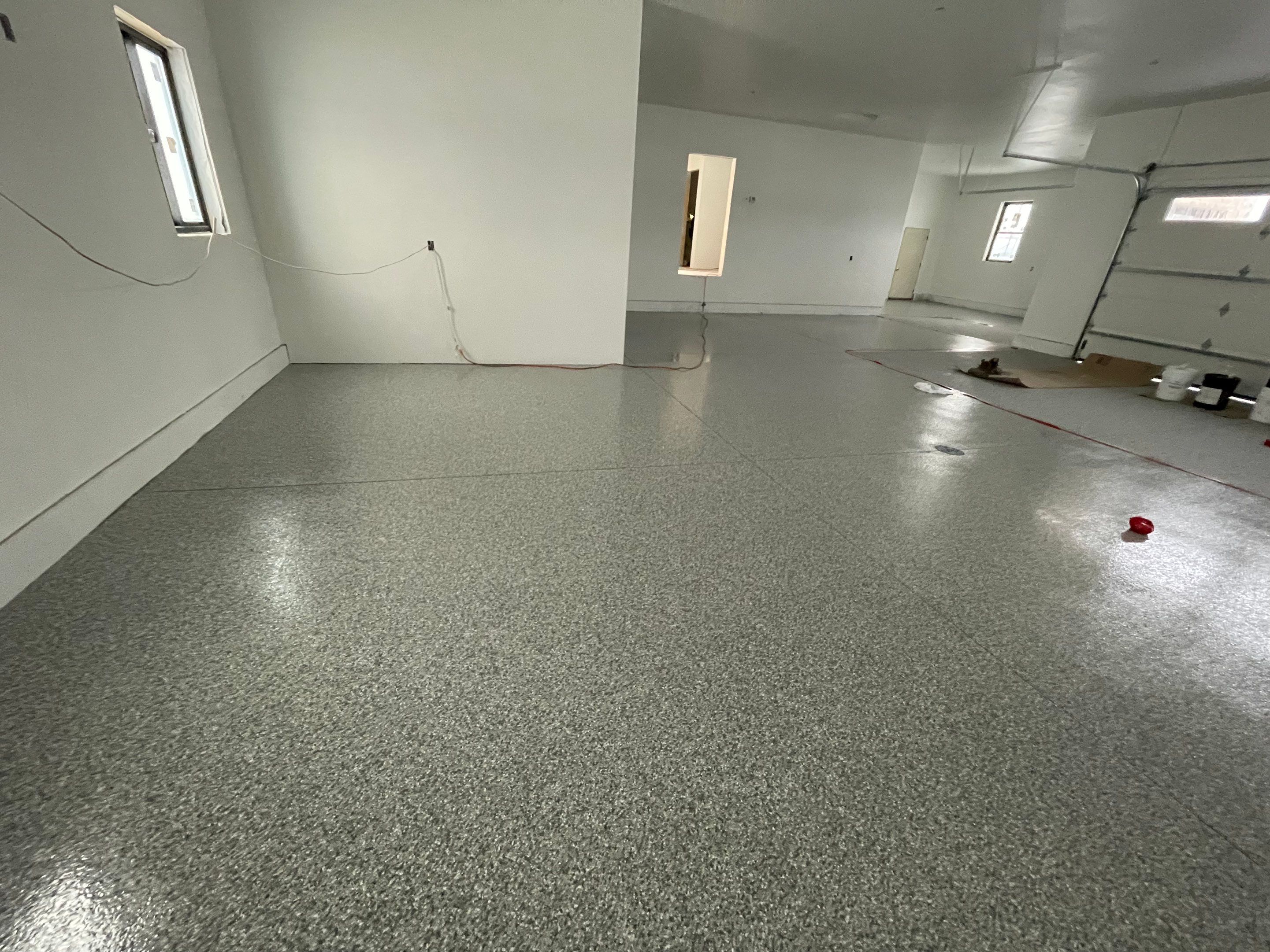 Garage using Slate Stone by Select Painting, Coatings & Garage Cabinets