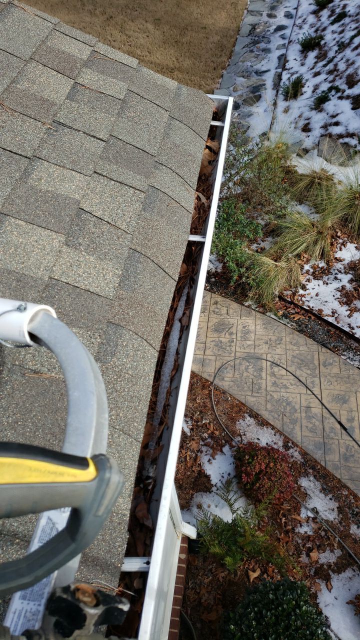 Gutter Cleaning using water by Power Wash Masters LLC