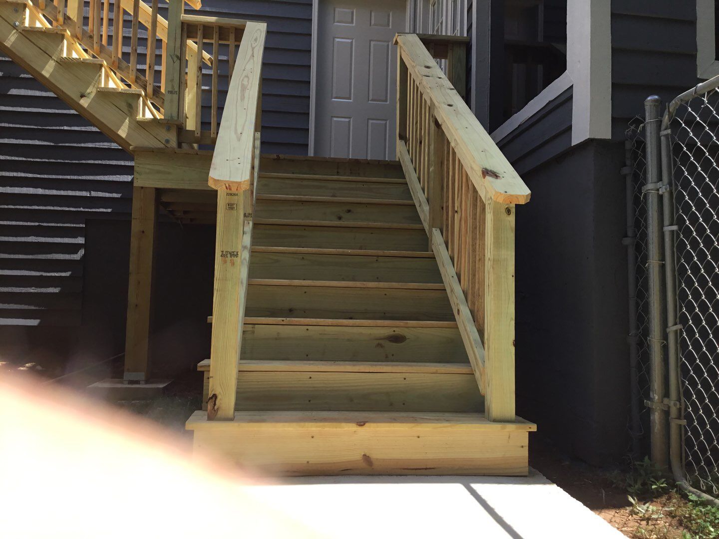 Elevated Wooden Deck and Front Porch Renovation in Marietta by Swift Home Renovations 