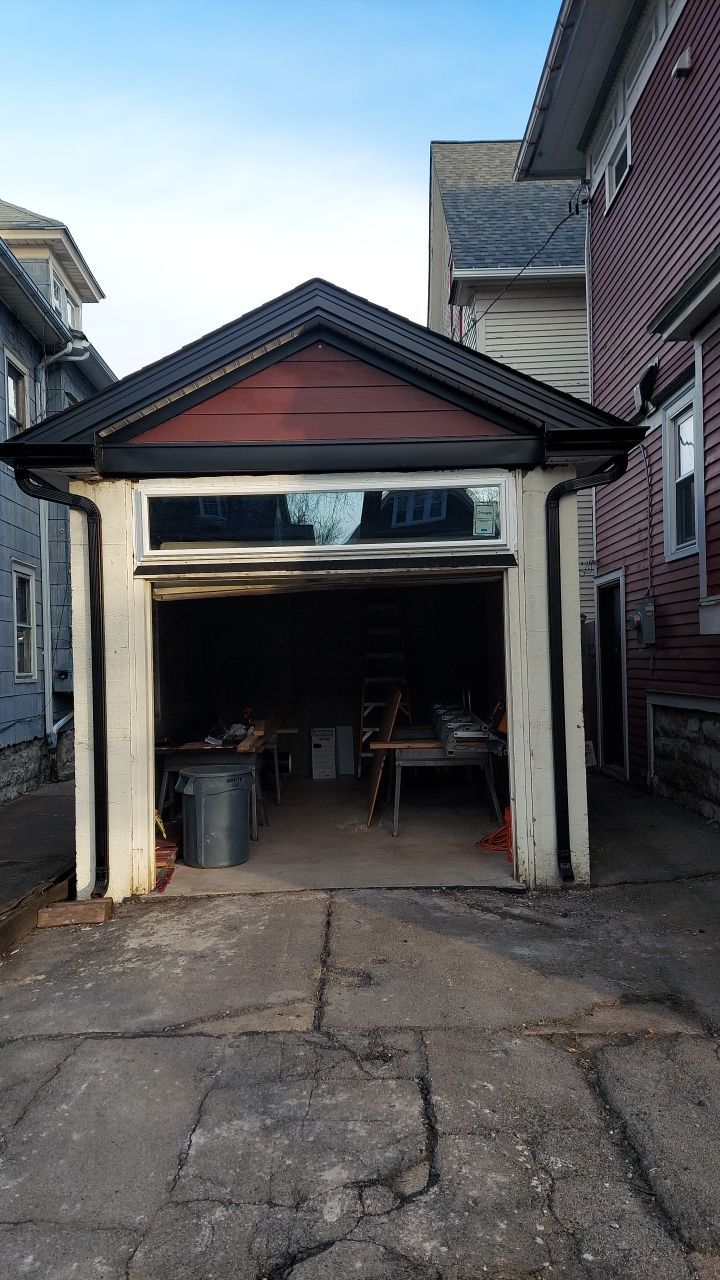 Exterior Renovations- Siding, Stamped Concrete, Porch, and Railings by Ivy Lea Construction