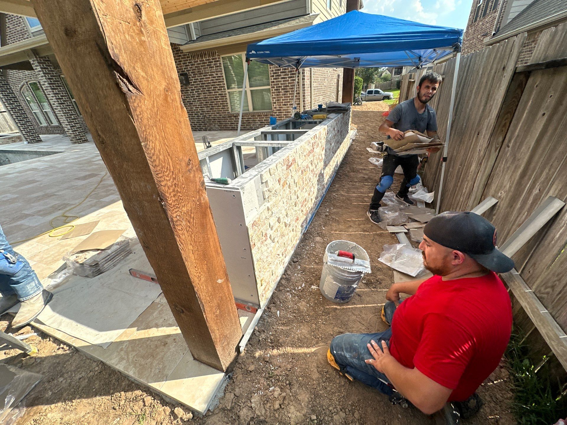 Covered Patio and Summer Kitchen in Spring,  TX by SophAlx LLC