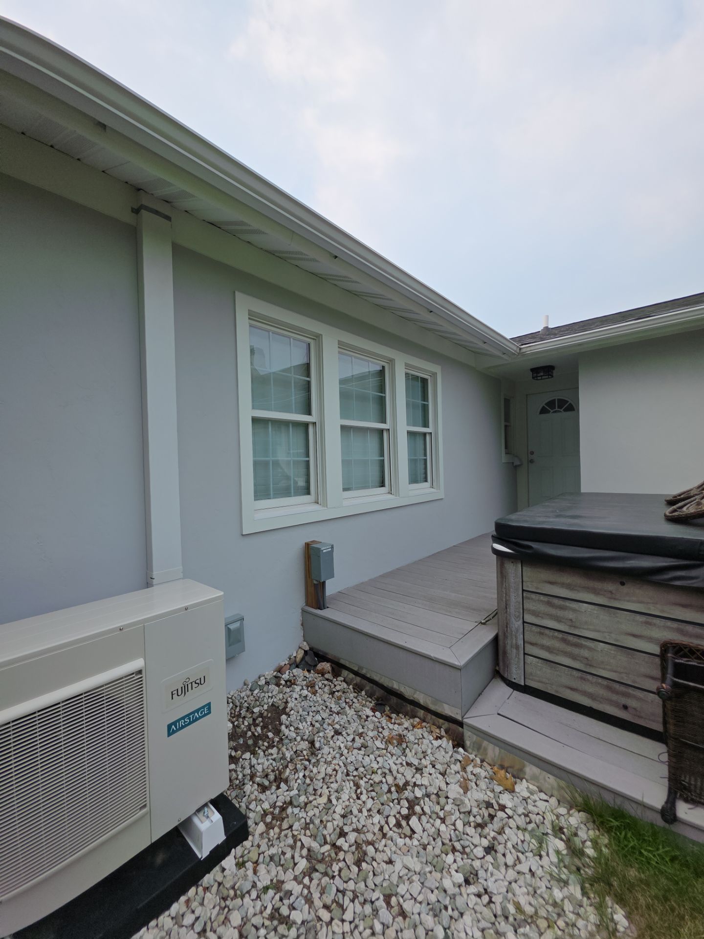 Norton Shores Residential Stucco Repair and Exterior Painting Refresh by Gordon Painting