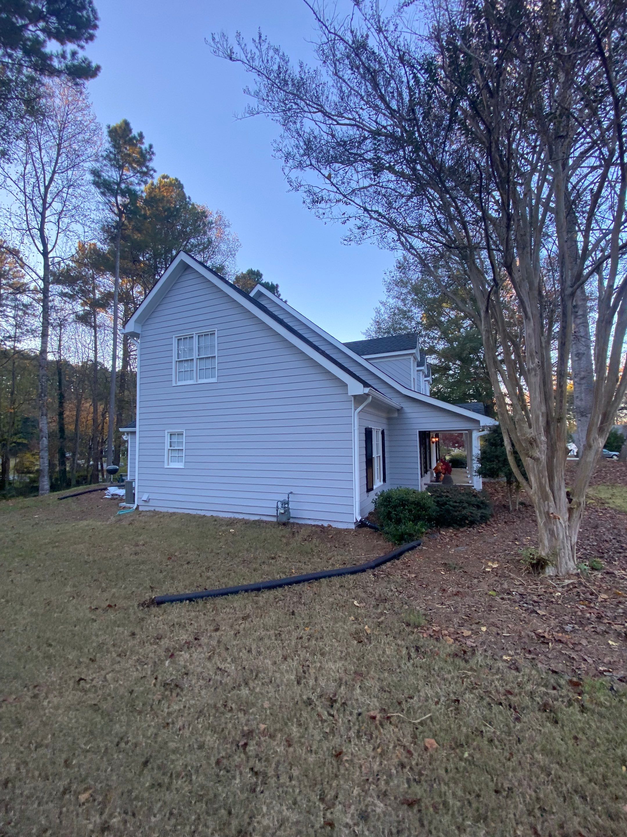Full Exterior Home and Detached Garage Painting in Kennesaw by Swift Home Renovations 