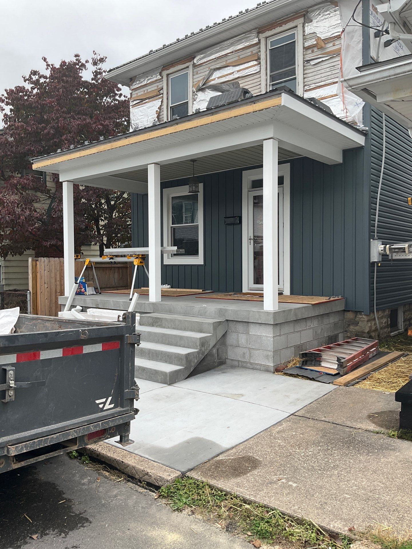 Charcoal Metal Roof & Blue Siding — A Refreshing New Look by Esh Builders