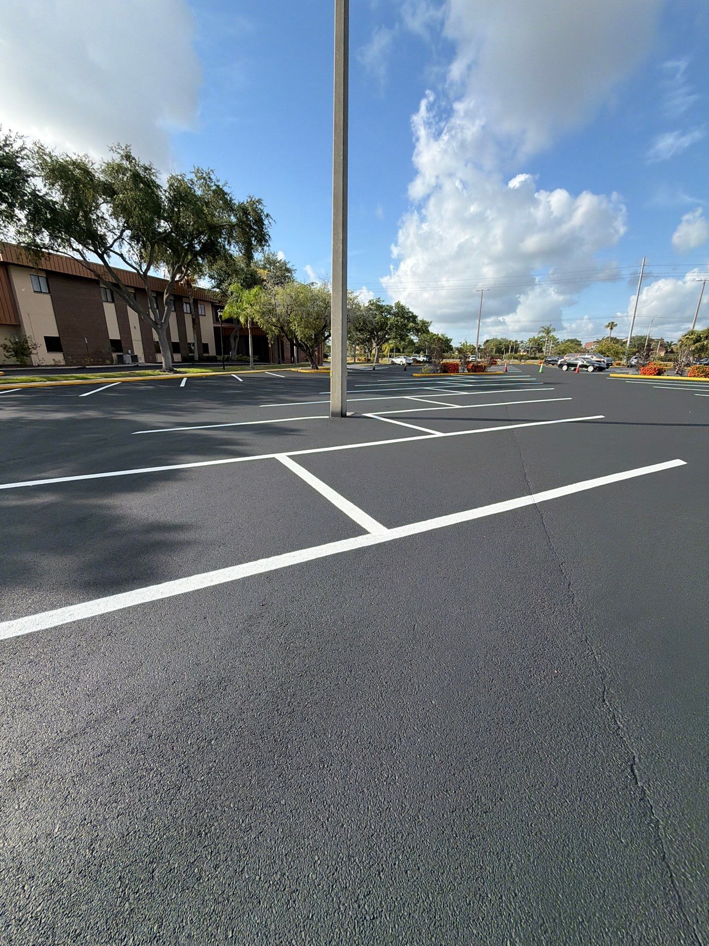 Comprehensive Asphalt Repair and Sealcoating for Sun City Center Church by Everline Coatings & Services - Southwest FL