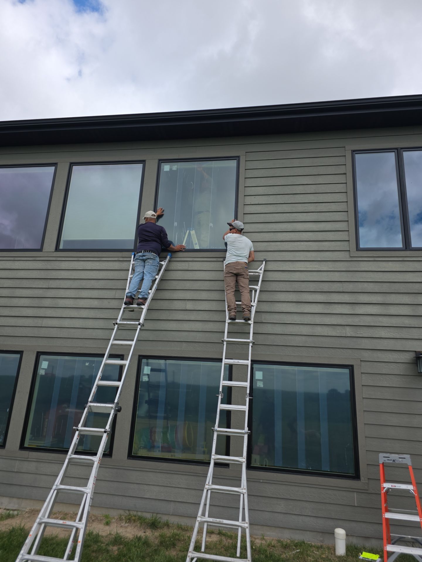 Pella Window and Seamless Gutter Installation in Ravenna by Loyal Nine