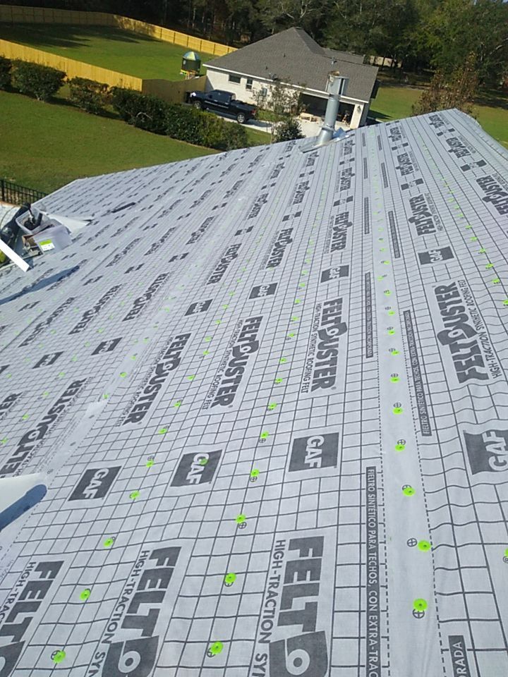 Residential Roofing Installation using Roof Replacement by American Roofing & Construction LLC
