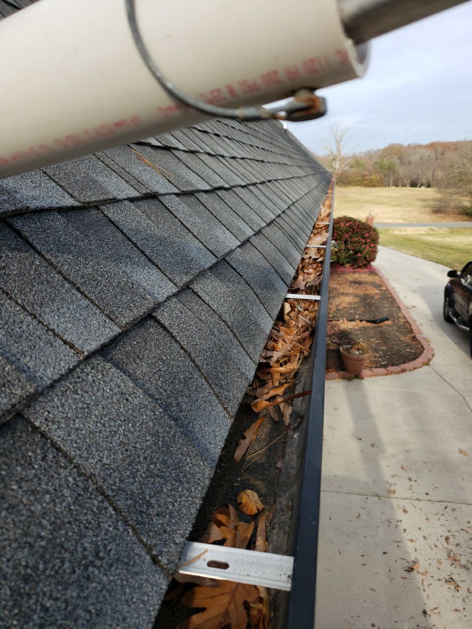 Gutter Cleaning using water by Power Wash Masters LLC