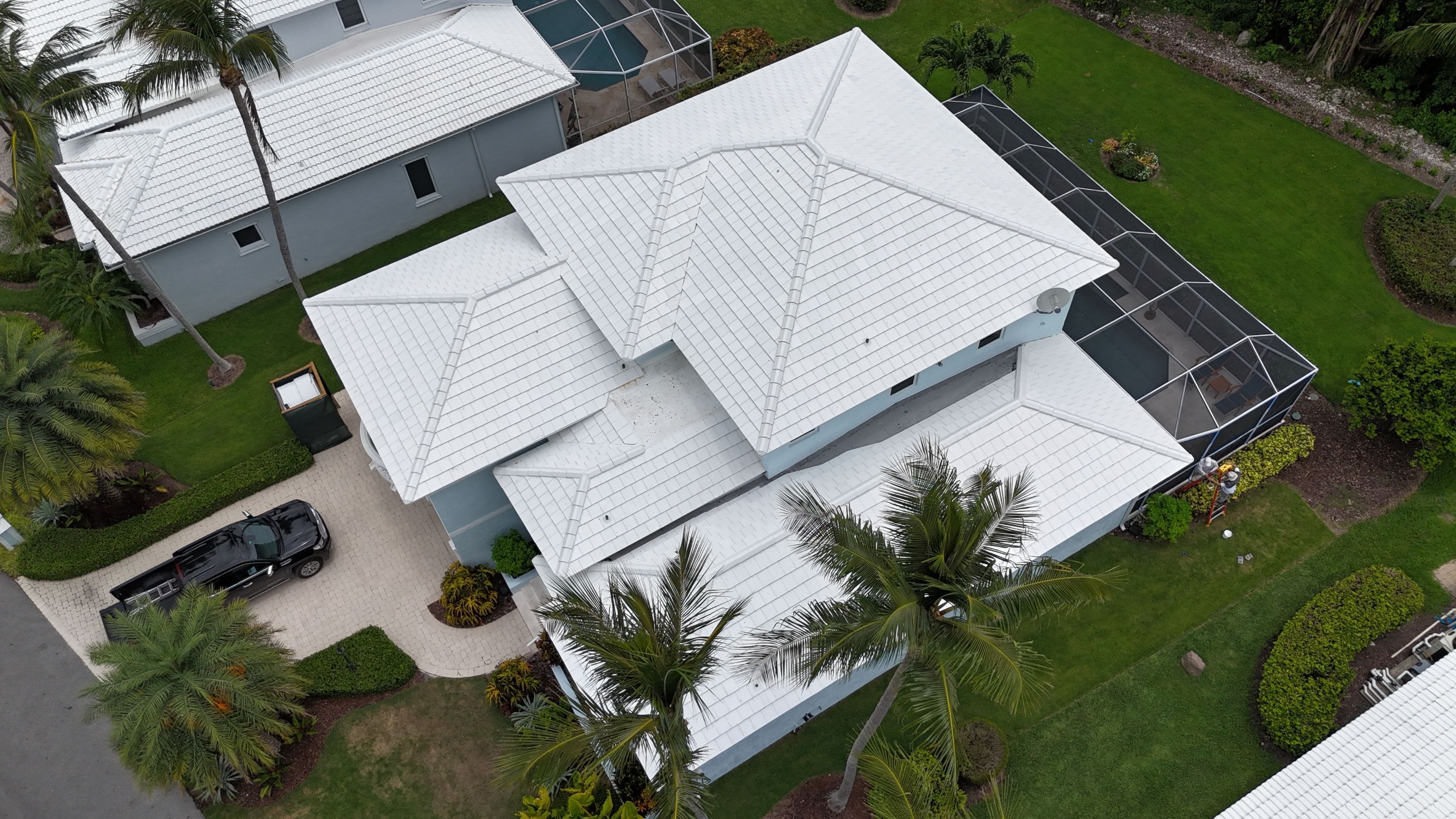 Reroof with Double Roll Cement Tile color "White" by BOB HILSON & CO INC
