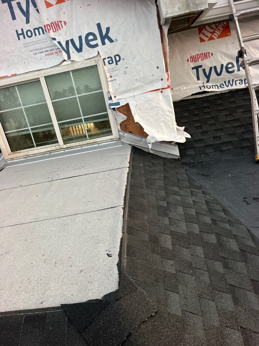 Shingle roof repair by Durabilis Roofing INC