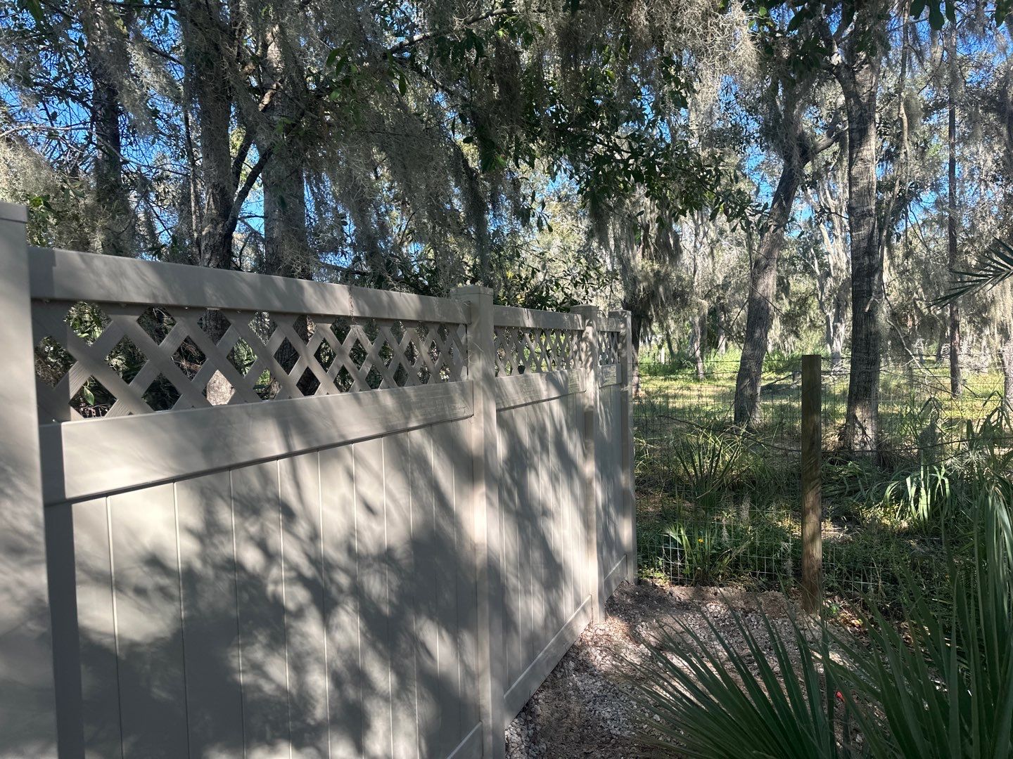 Vinyl Fence Installation using 6Ft Tan Vinyl Privacy Fence with Lattice Top by Asap fence and gates, LLC