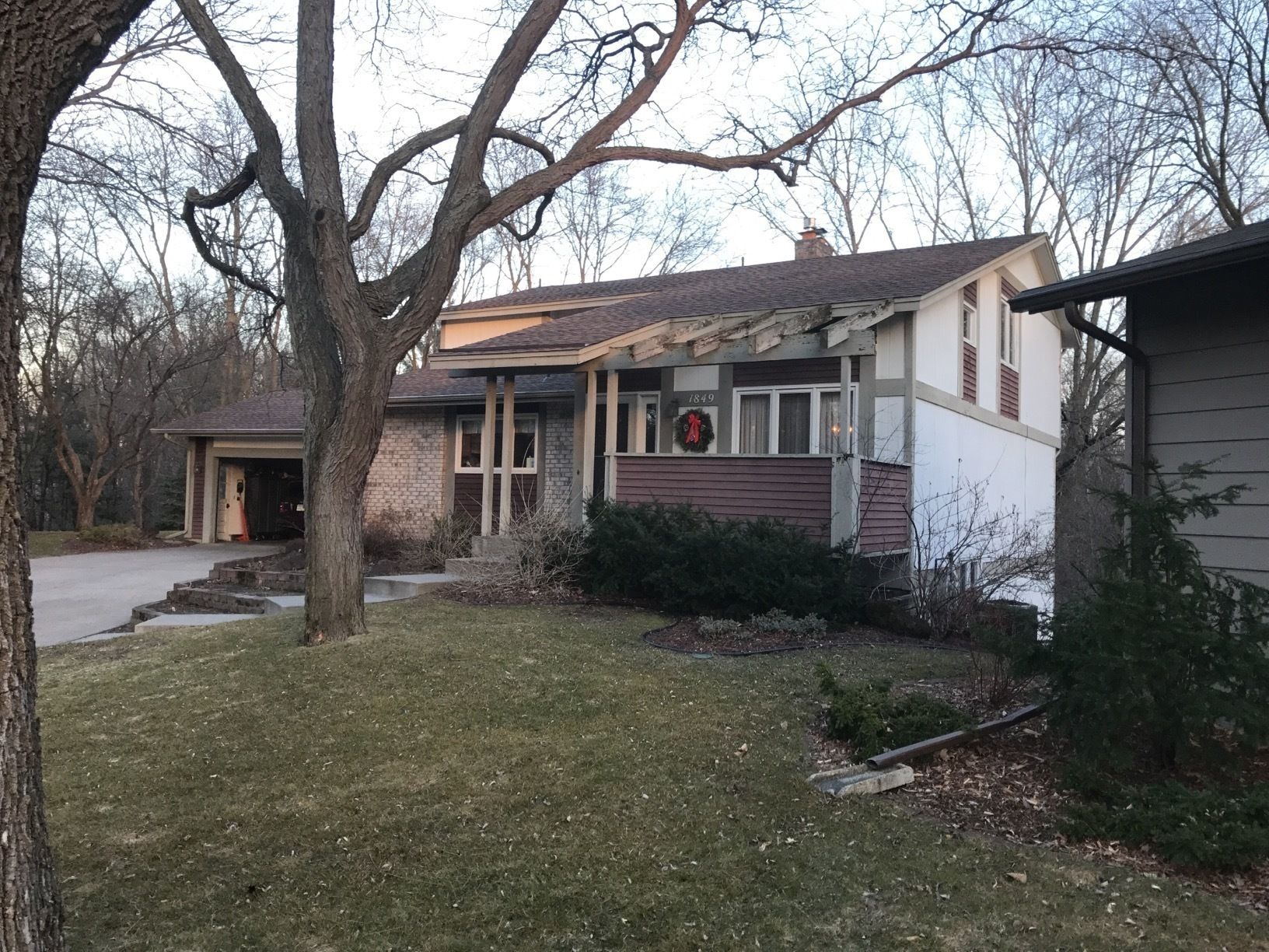 Siding Installation using LP SmartSide and Pella Vinyl Windows by MODERN EXTERIOR SYSTEMS