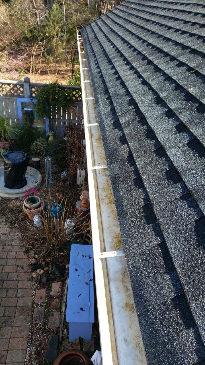Gutter Cleaning using water by Power Wash Masters LLC