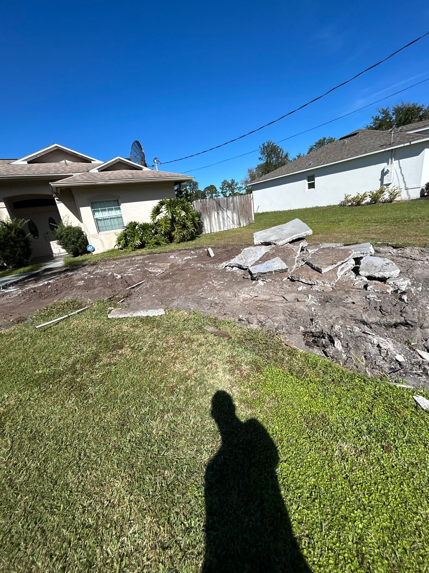 New concrete driveway by Courtesy screening