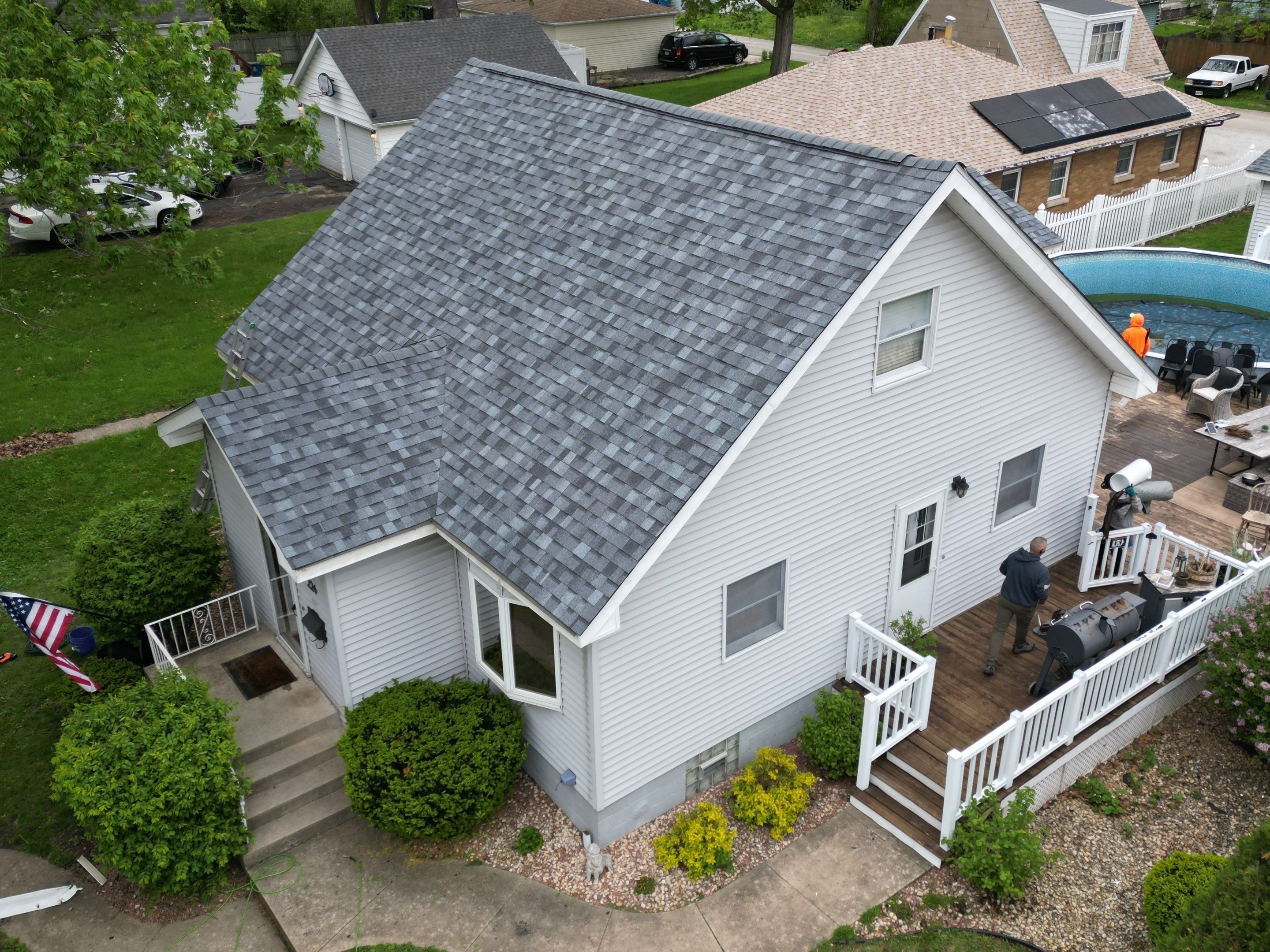 Roof replacement by Optimal Home Improvement 