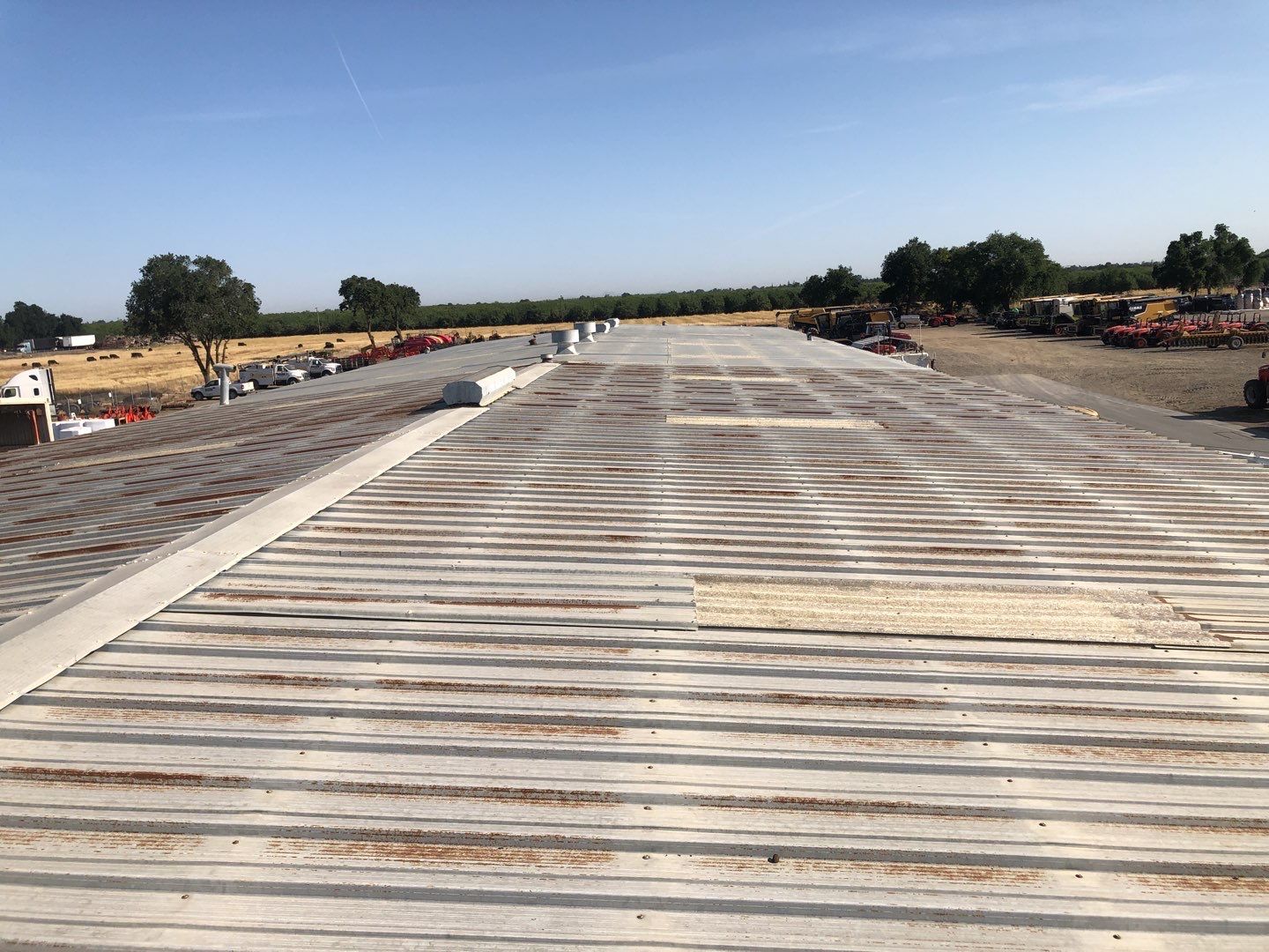 Spray foam and coatings using Conklin Benchmark/PUMA XL coatings and spray foam by Straight Edge Roofing Inc