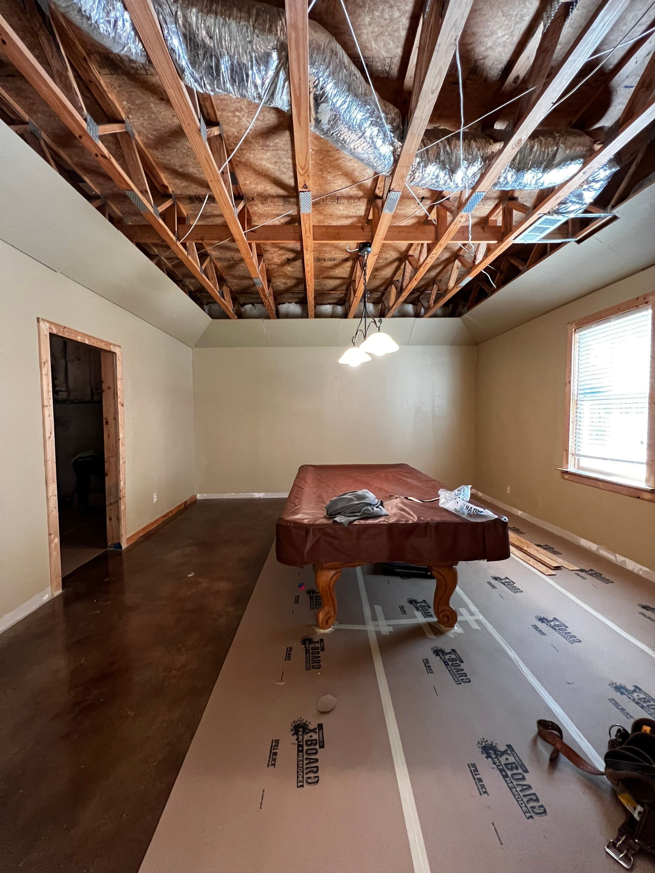 Finished Basement Renovation Featuring Polished Concrete in Atlanta by Swift Home Renovations