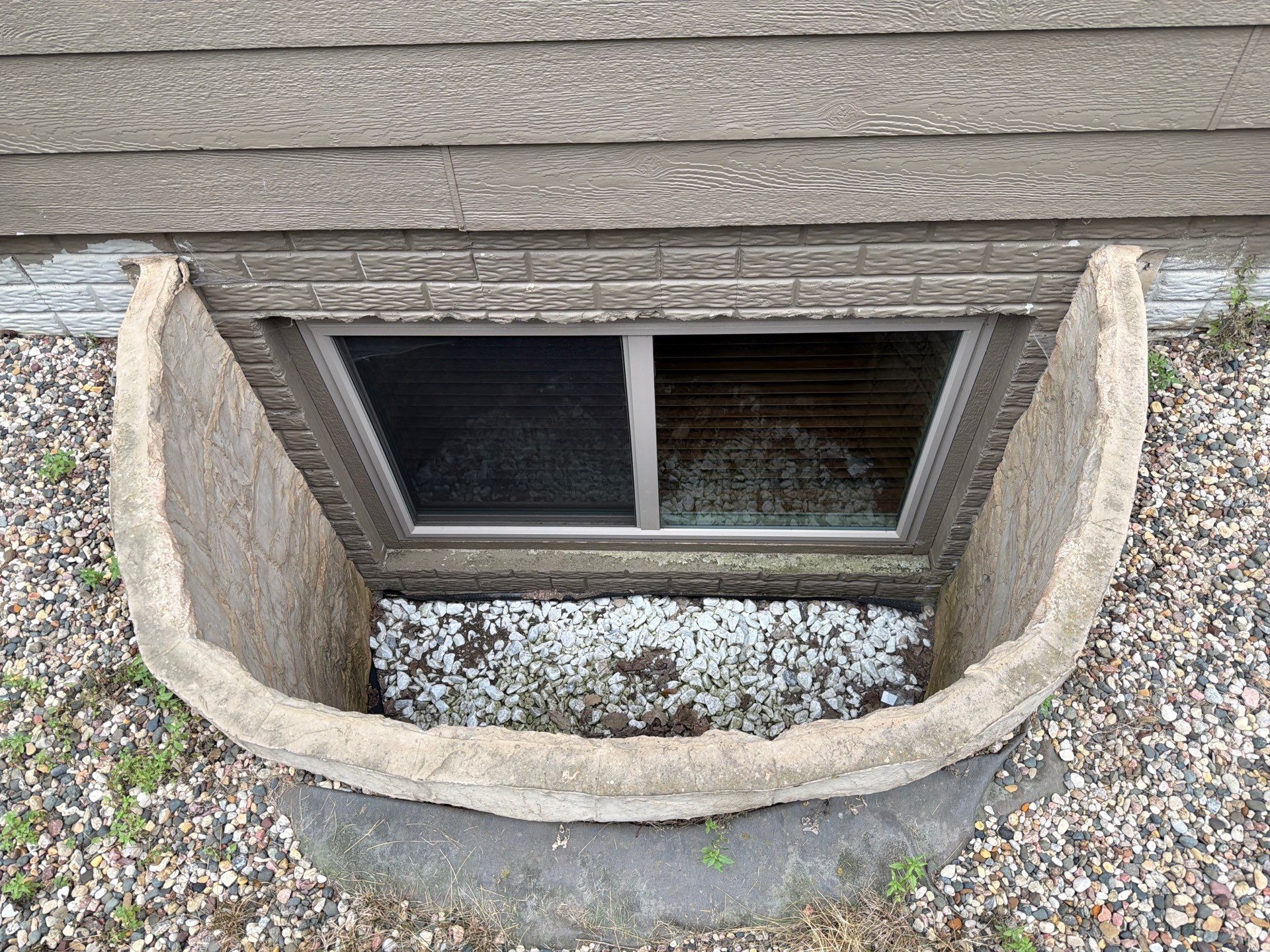 Full Exterior Siding Repaint for Sioux Falls Home and Garage by Select Painting, Coatings & Garage Cabinets
