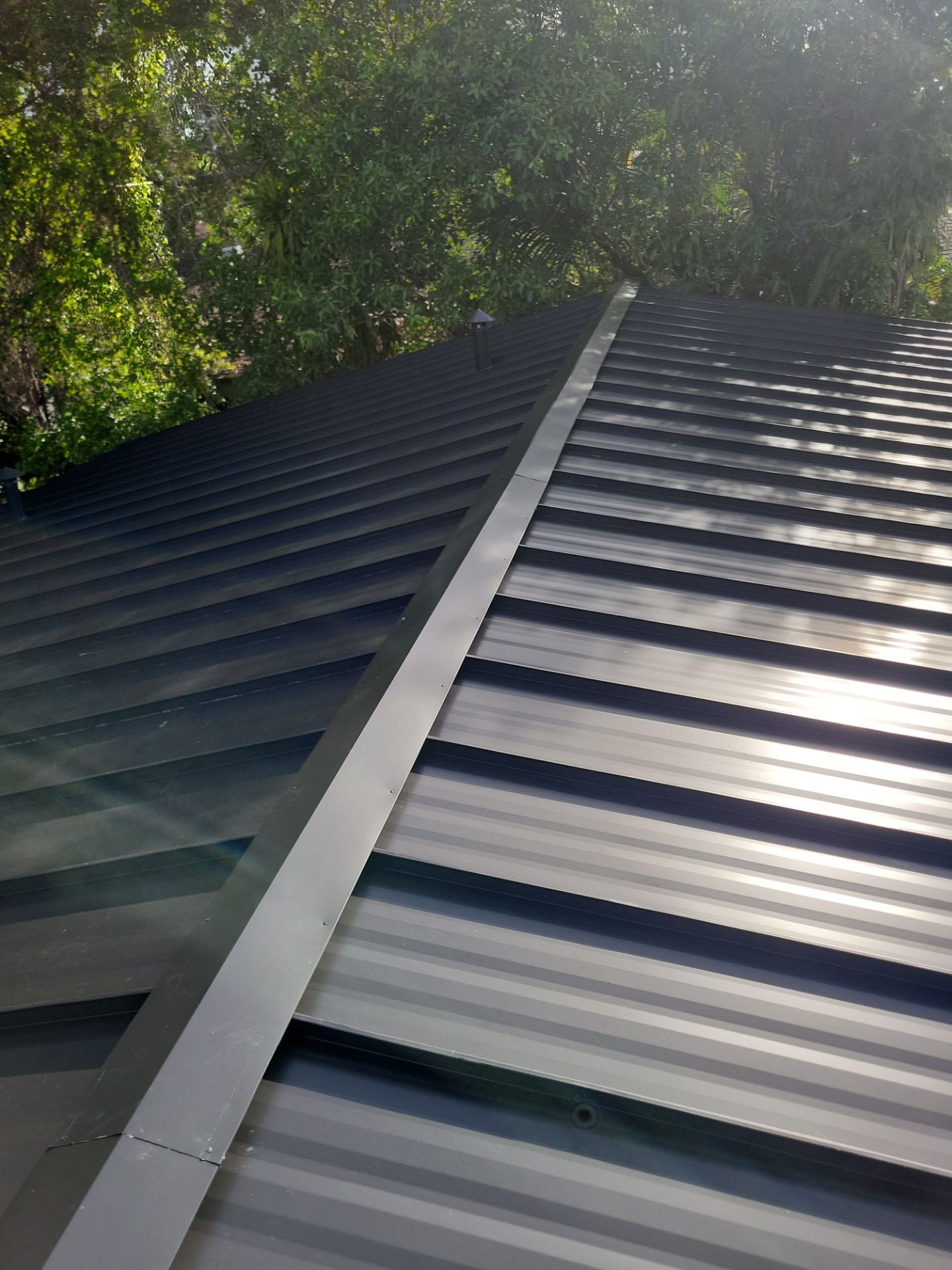 Metal Roof - Matte Black Color. Metal Alliance. by Art's Roofing & Construction