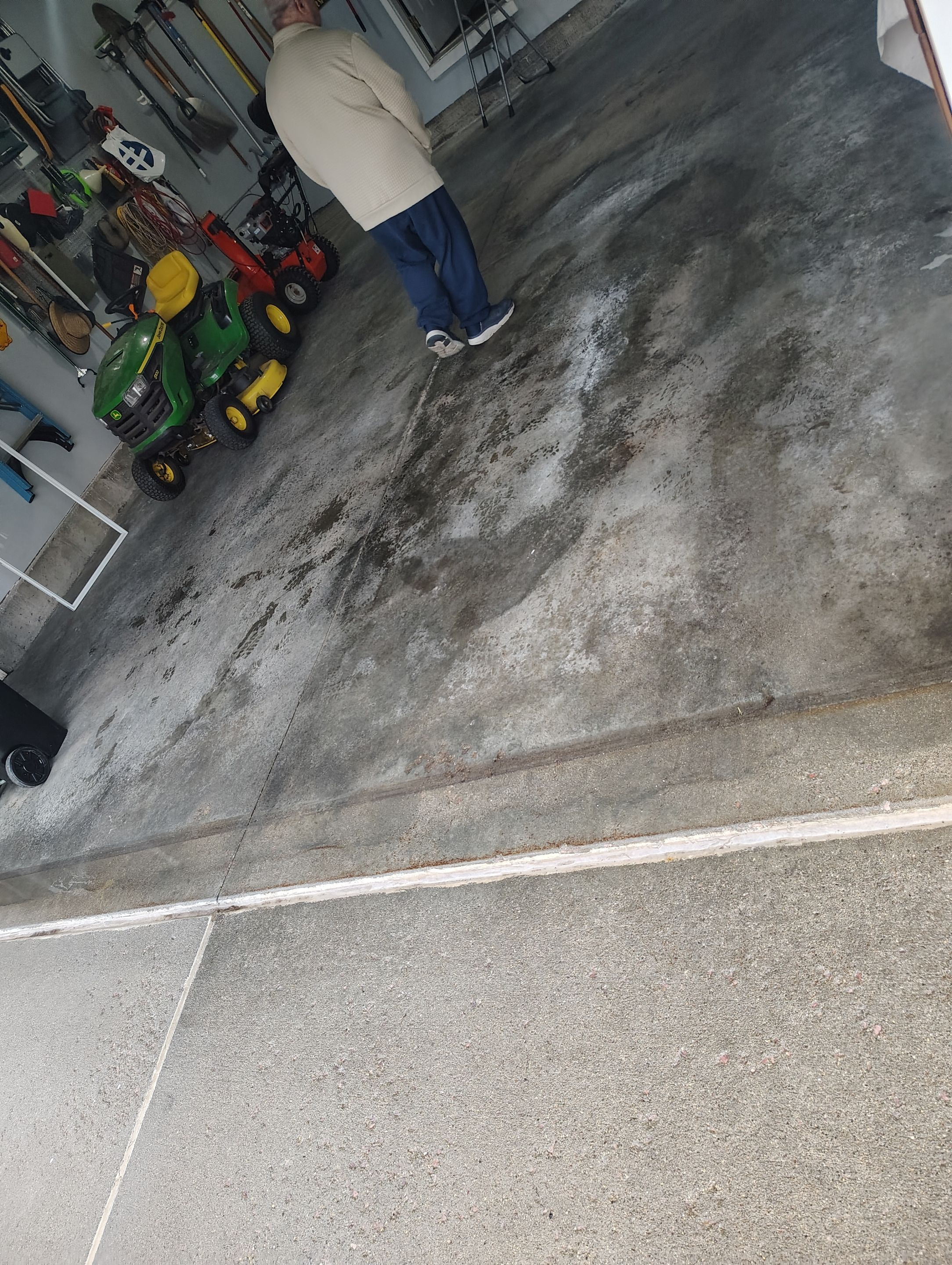 High-Gloss Epoxy Garage Floor Coating in Sioux Falls by Select Painting, Coatings & Garage Cabinets