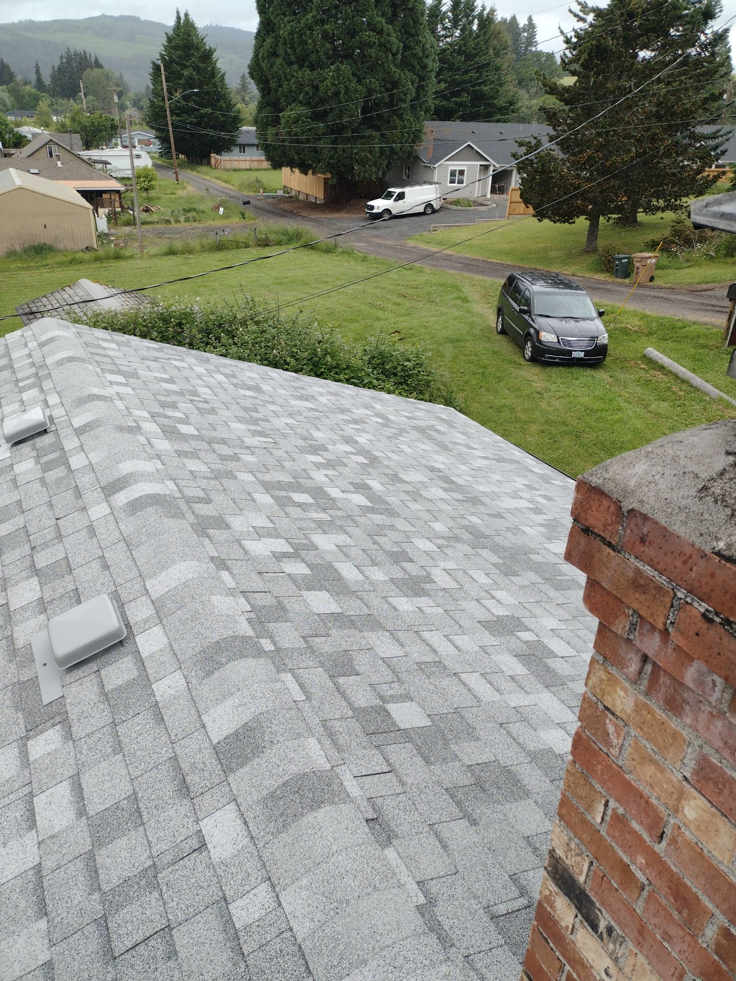 Residential Roofing Installation using IKO Dynasty (Color: Frostone Grey) by Orezona Building & Roofing Company, Inc.