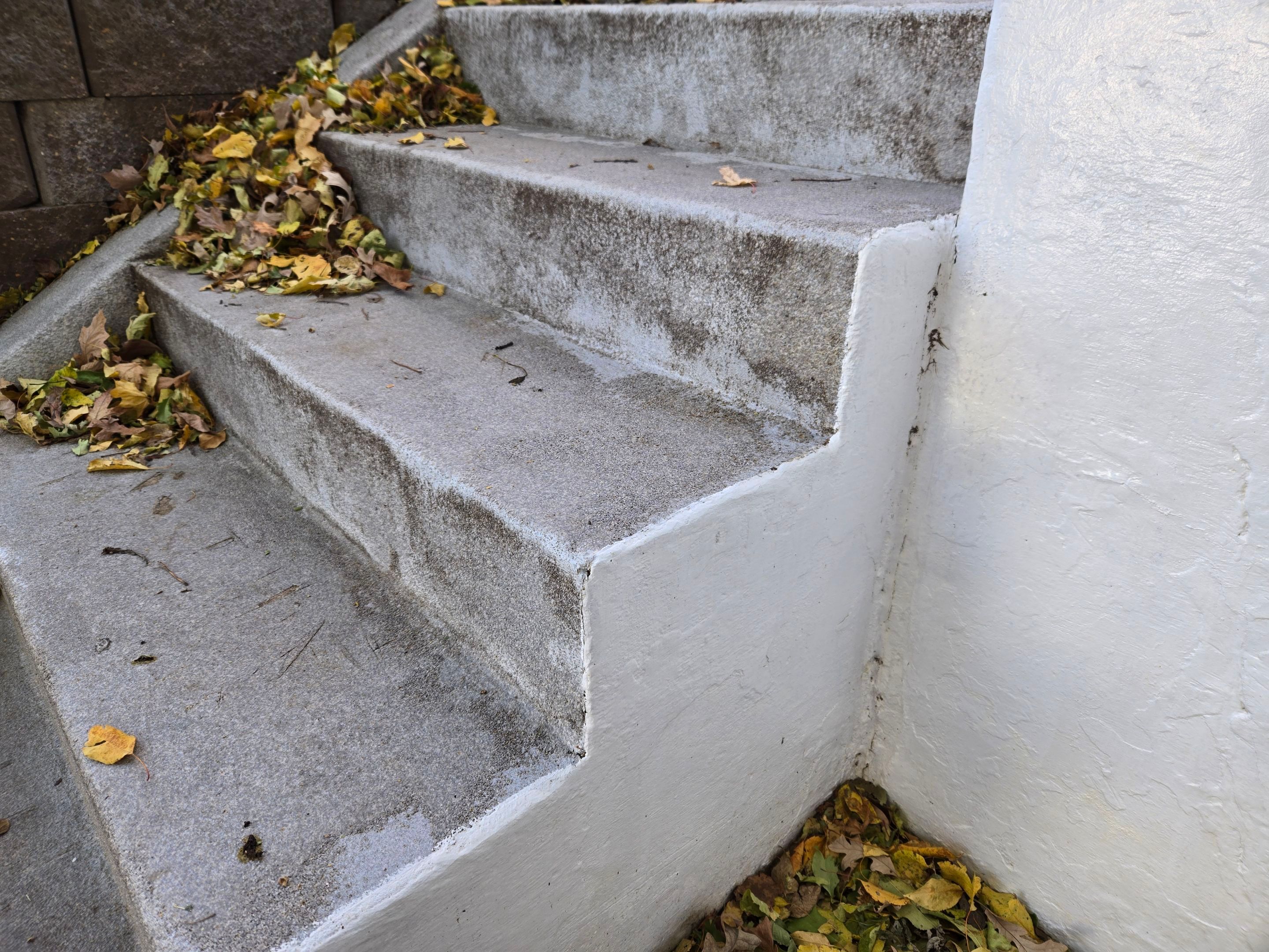 Grey Polyaspartic Porch and Stair Resurfacing in Sioux Falls by Select Painting, Coatings & Garage Cabinets
