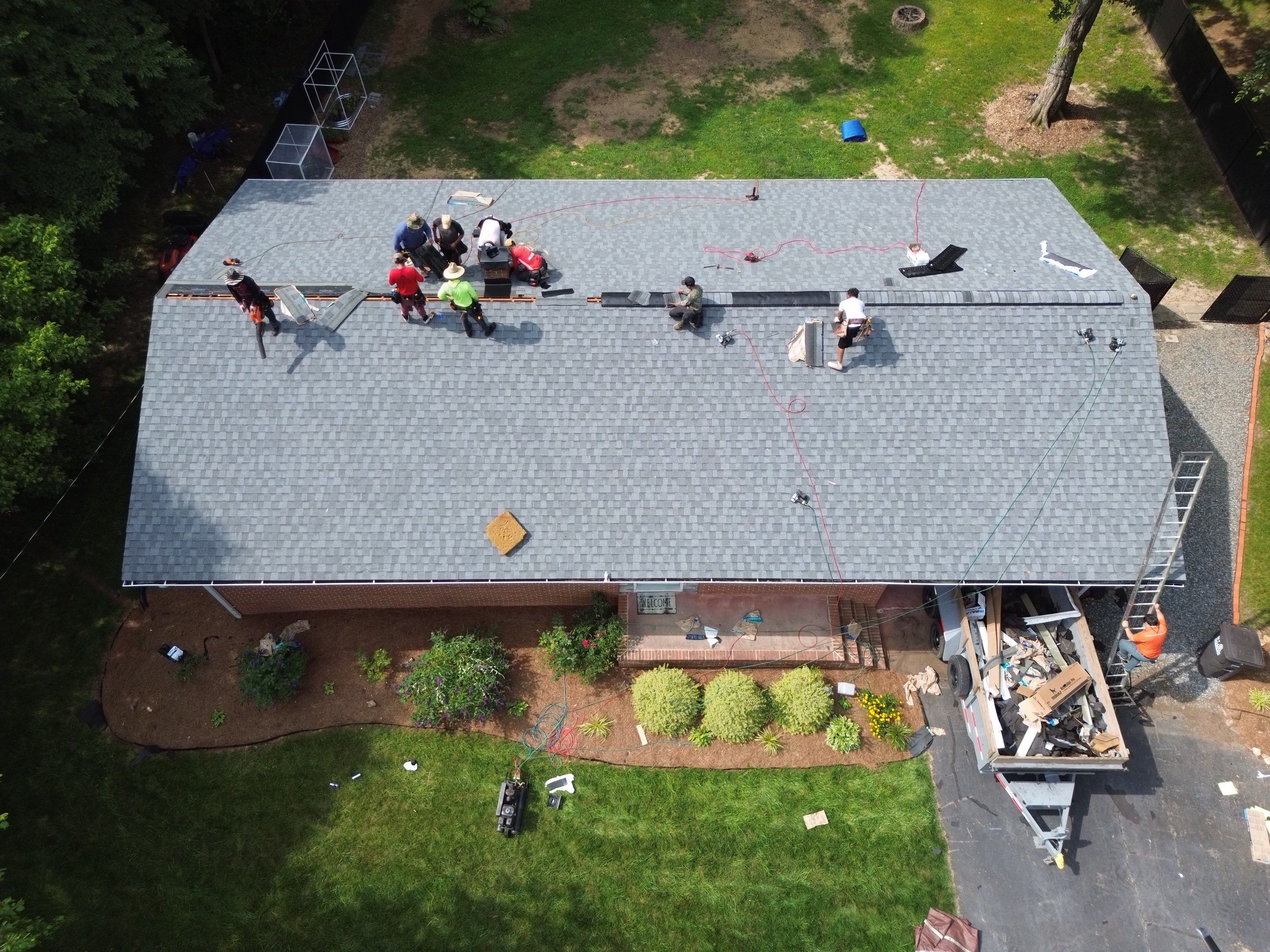 Roof and gutter replacement by hail and wind damage by Just Brilliant Restoration JBR
