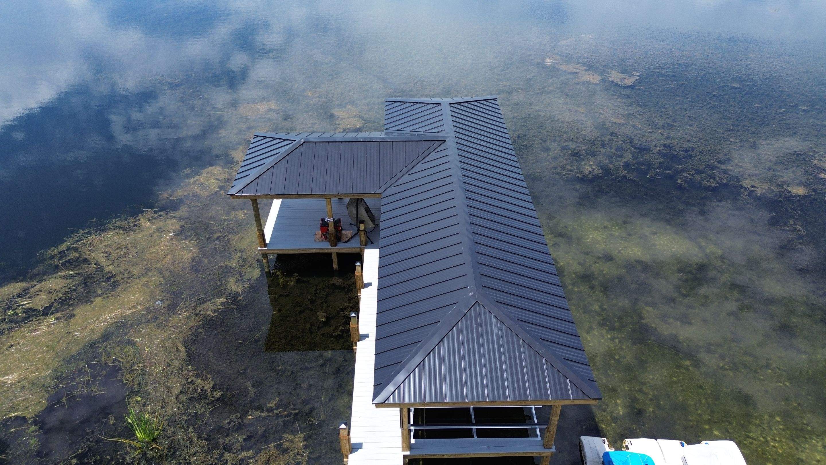 Residential Dock reroof  by Gold Key Roofing