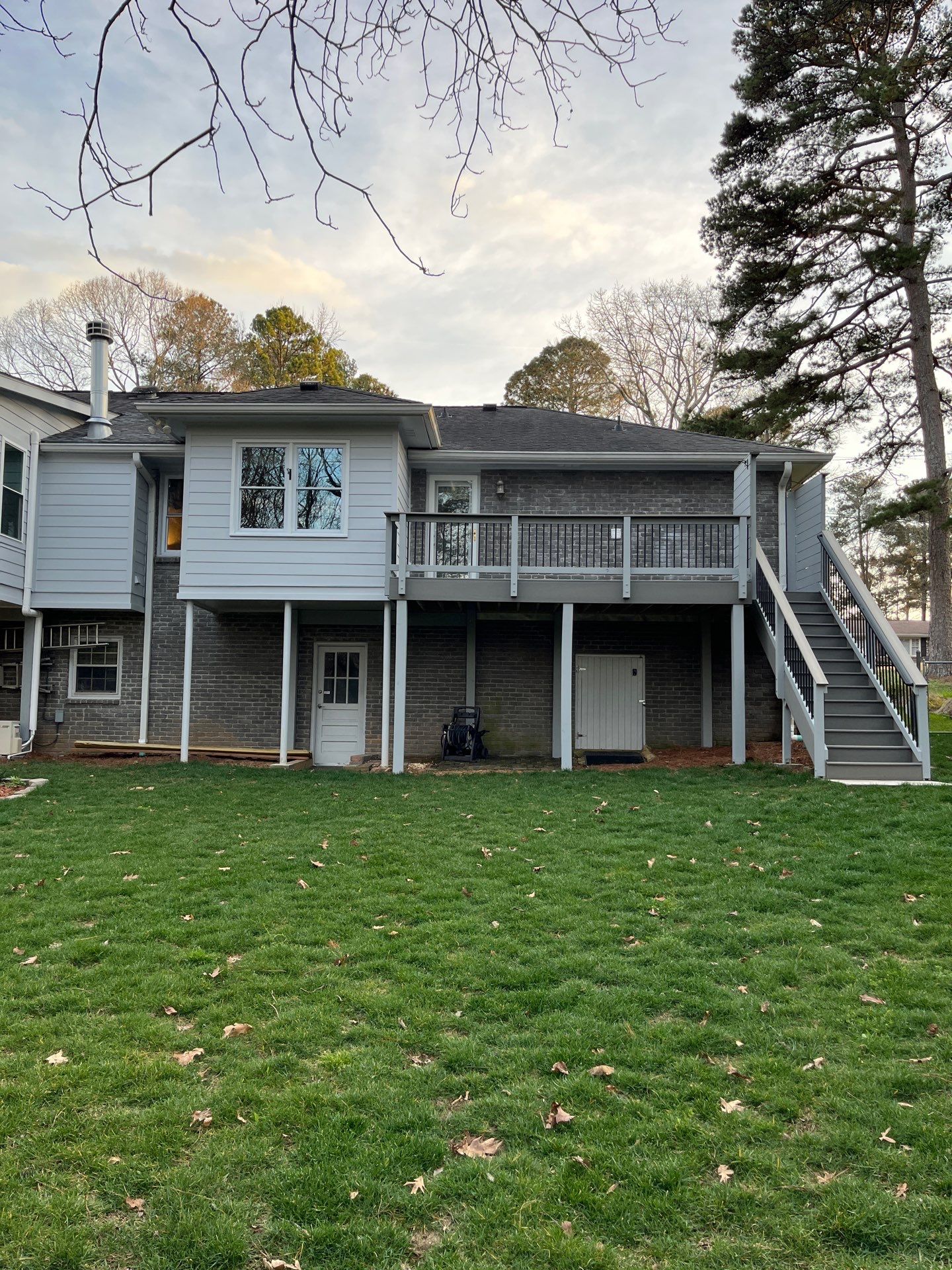 James Hardie Siding Replacement, Trex Railing Install, Exterior Painting, and Staining in Stone Mountain, GA by Nelson Exteriors 