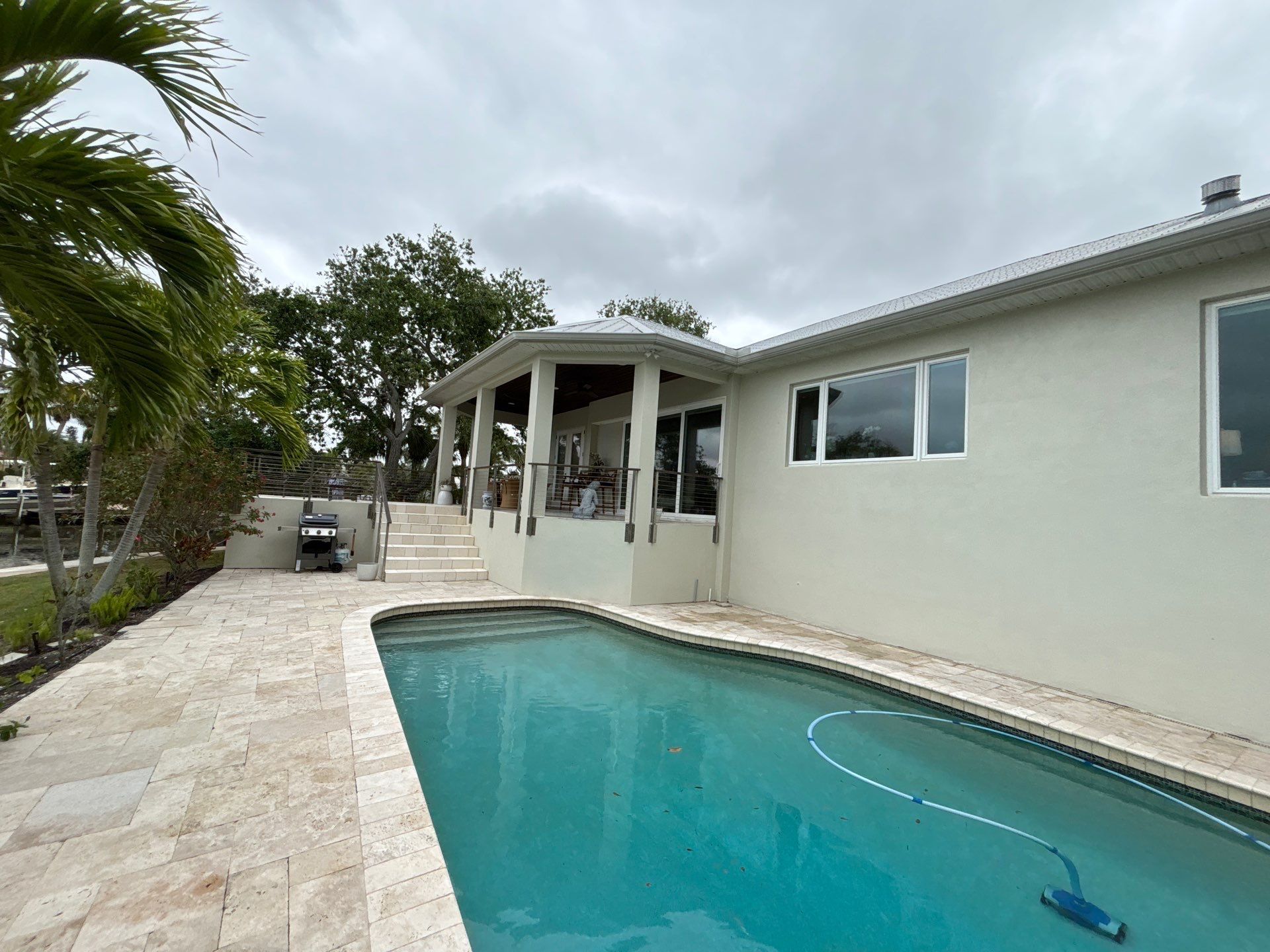 6-Inch White Seamless Gutters Installation in Siesta Key FL by Gutter Professors