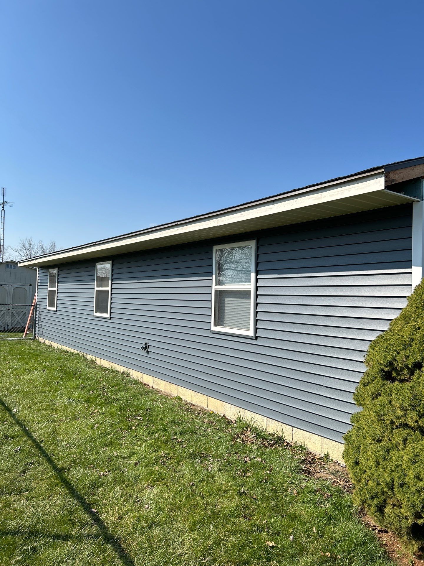 Storm Damage Residential Roof and Siding Installation by WIW Enterprises Inc