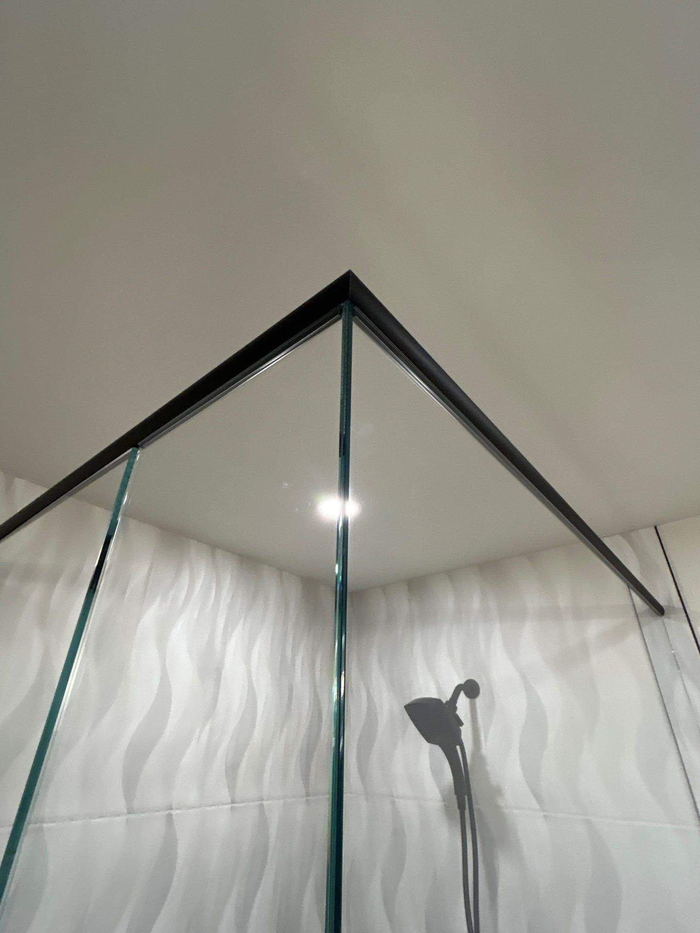 Frameless Shower Enclosure w/Header Bar by Cheshire Glass Company