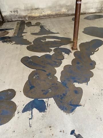 Garage Floor In Mt. Everest by Spectrum Painting, LLC