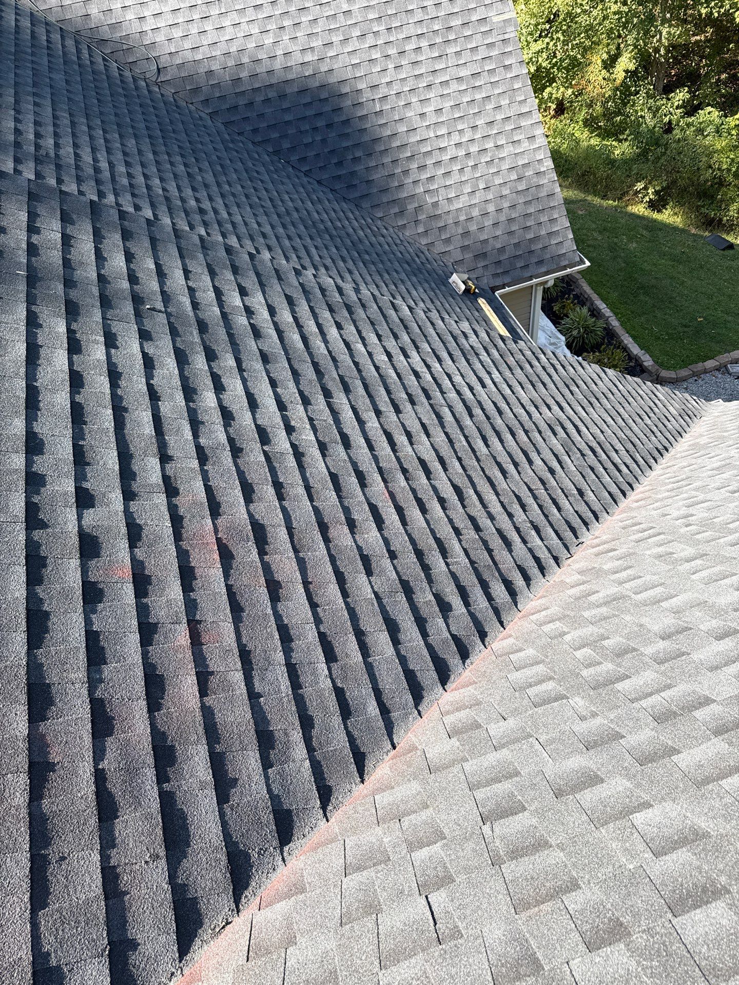 Residential Roofing Installation using GAF Timberline HDZ Charcoal by Rainstoppers Roofing