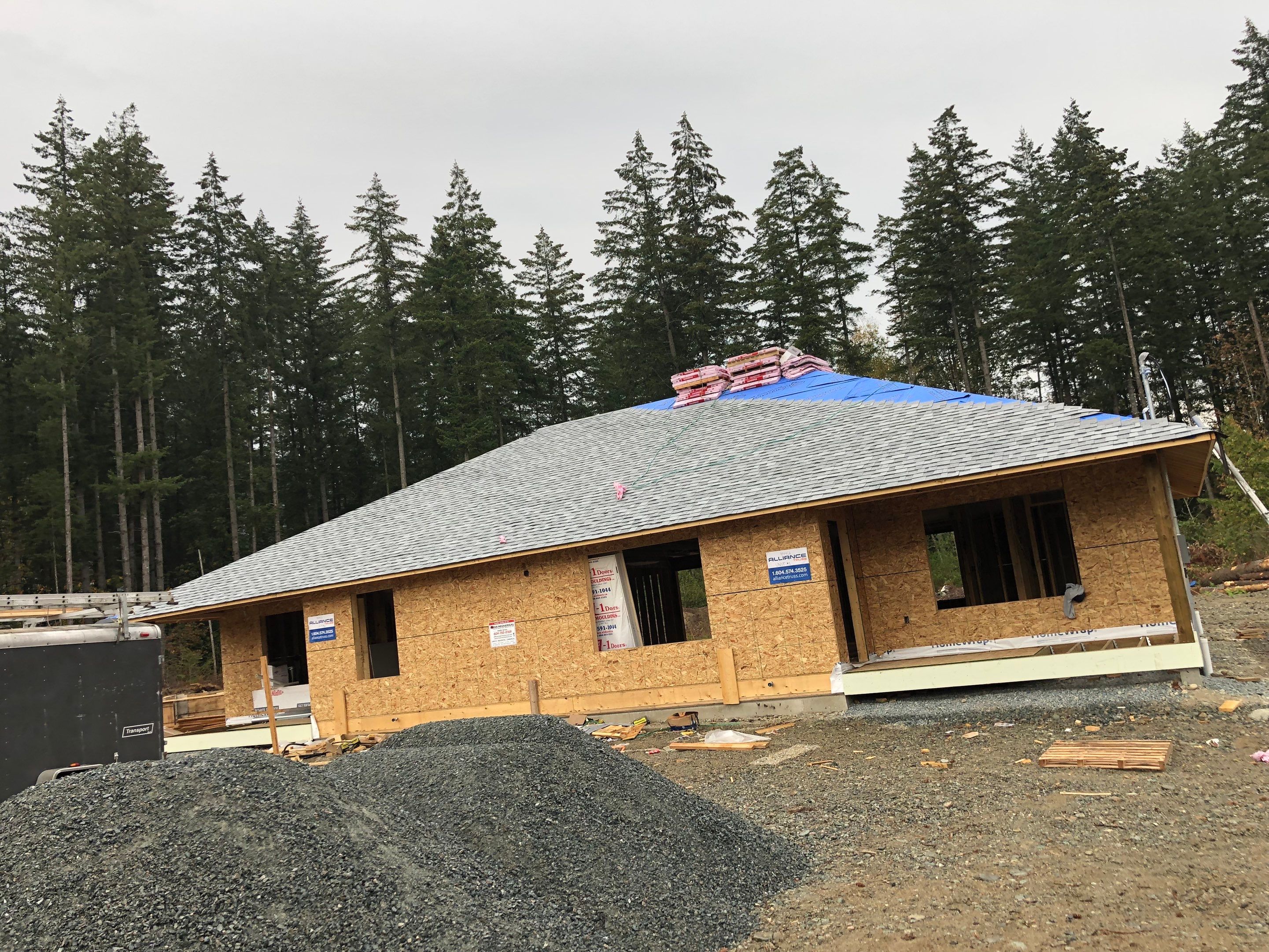 Residential Roofing Installation using OC Oakridge shingles by Top Notch Roofing Inc