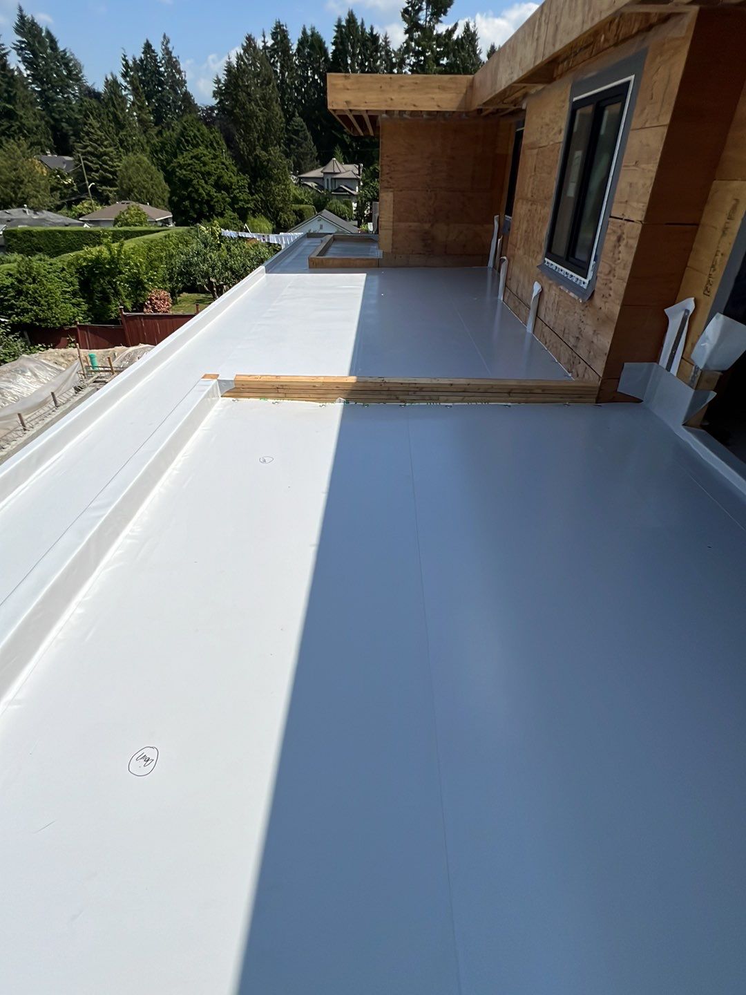 Residential Roofing Installation using Durolast roofing membrane by Top Notch Roofing Inc