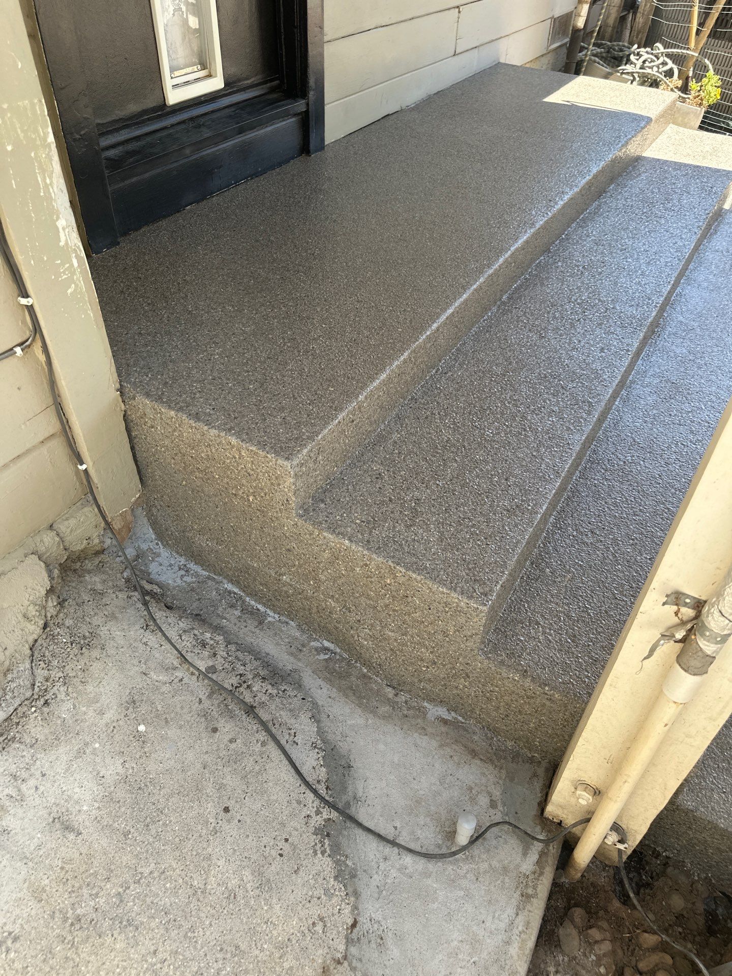 Obsidian Polyurea Coating for Atascadero Porch and Steps by MGP Coatings