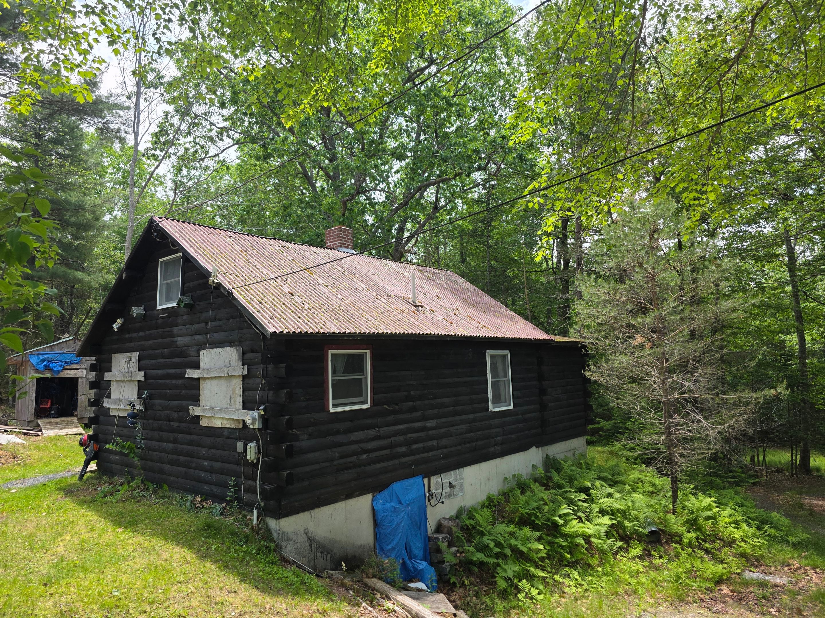 Cabin In the Woods by The B.A.R Roofing