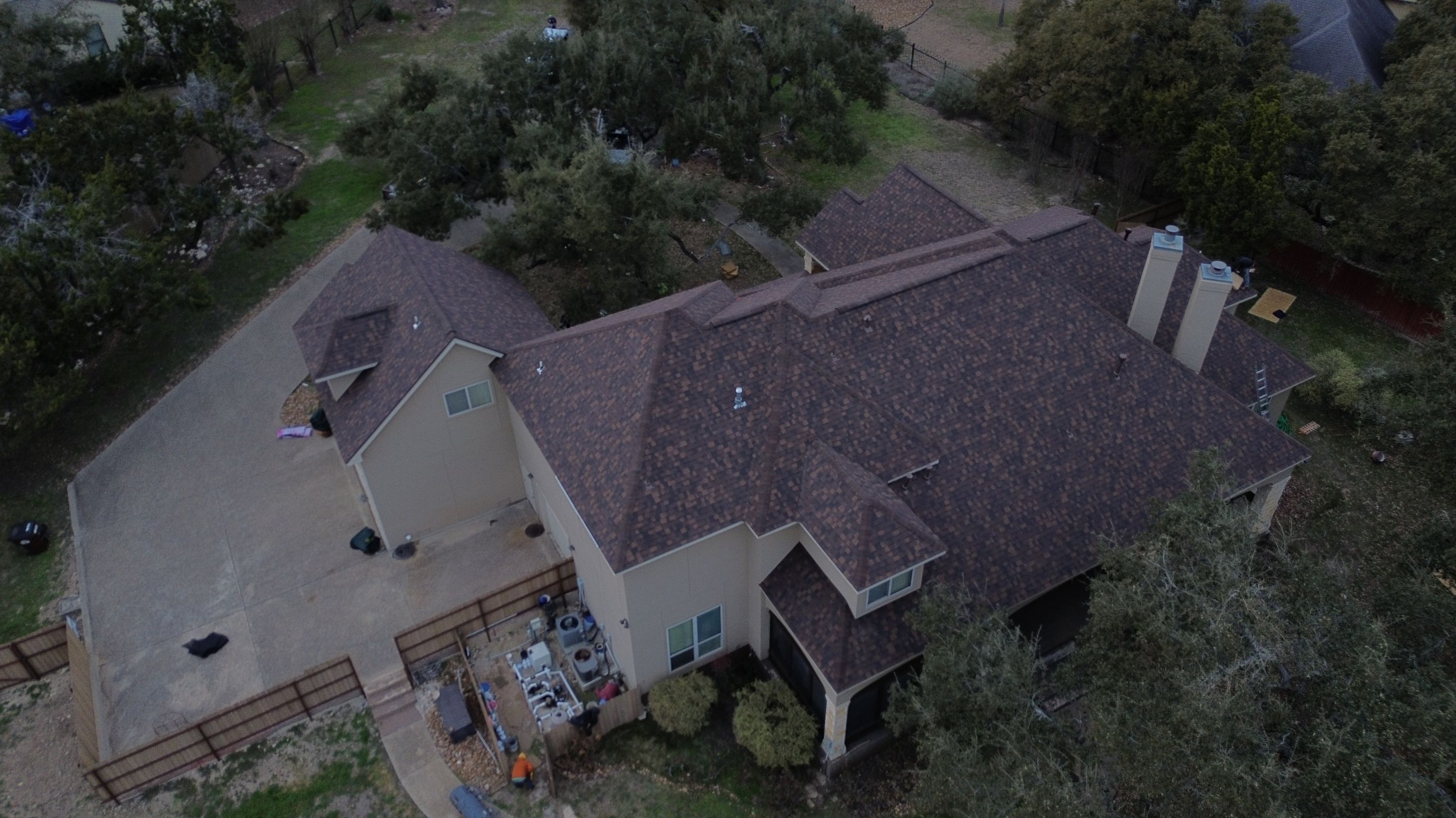 Residential Roof Replacement using 30 Year Laminate Shingles with High Profile Ridge by Premier Roofing and Contracting