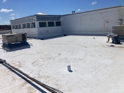 Full Roof Tear-off with new Code ISO insulation and 50 Mil Membrane
